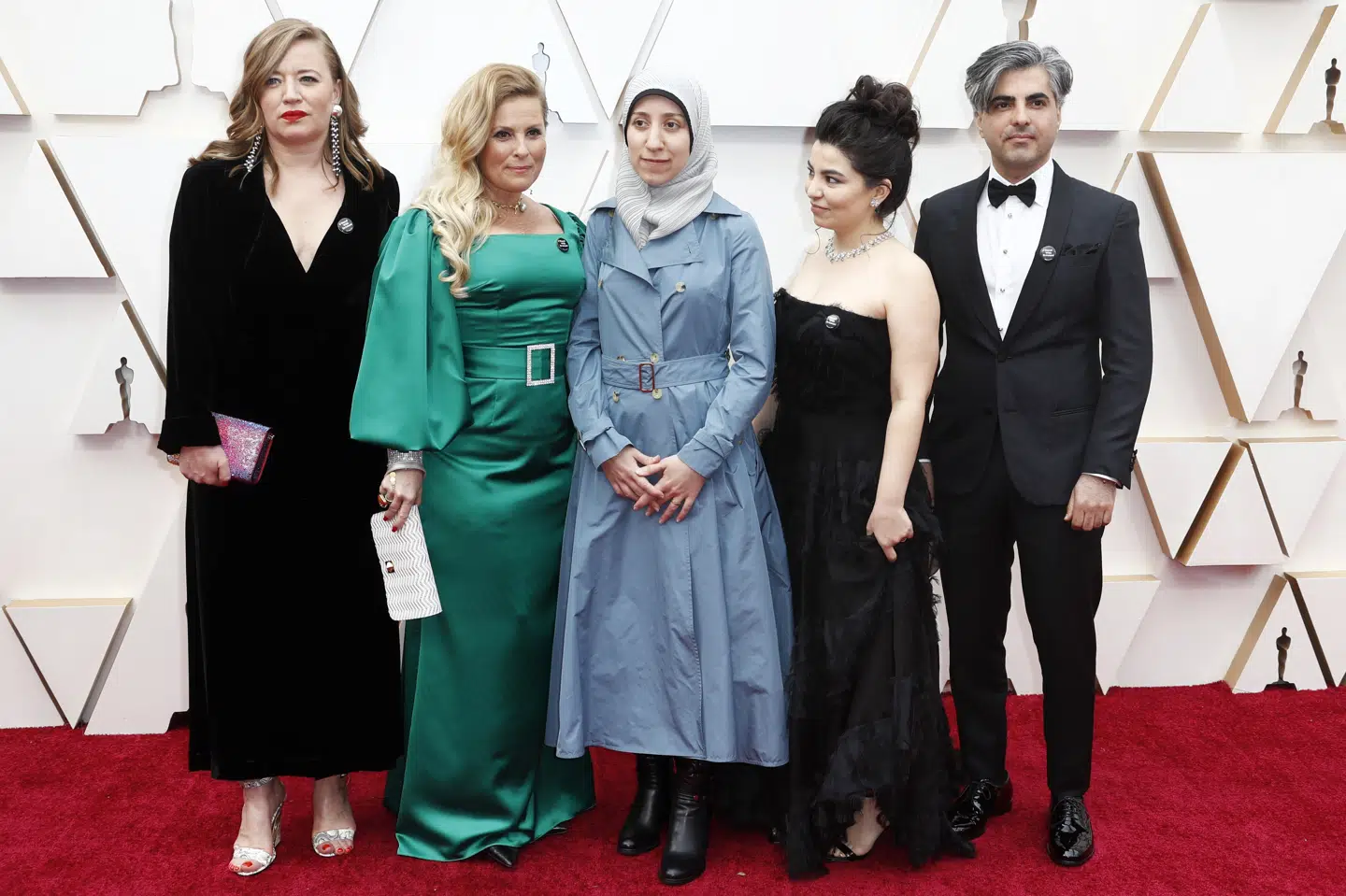 Her ses en del af holdet bag dokumentarfilmen The Cave på den røde løber ved Oscar-uddelingen i februar. Fra venstre: Producenterne Sigrid Dyekjær og Kirstine Barfod, læge Amani Ballour, manuskriptforfatter Alisar Hasan og instruktør Feras Fayyad. Eric Gaillard/Reuters