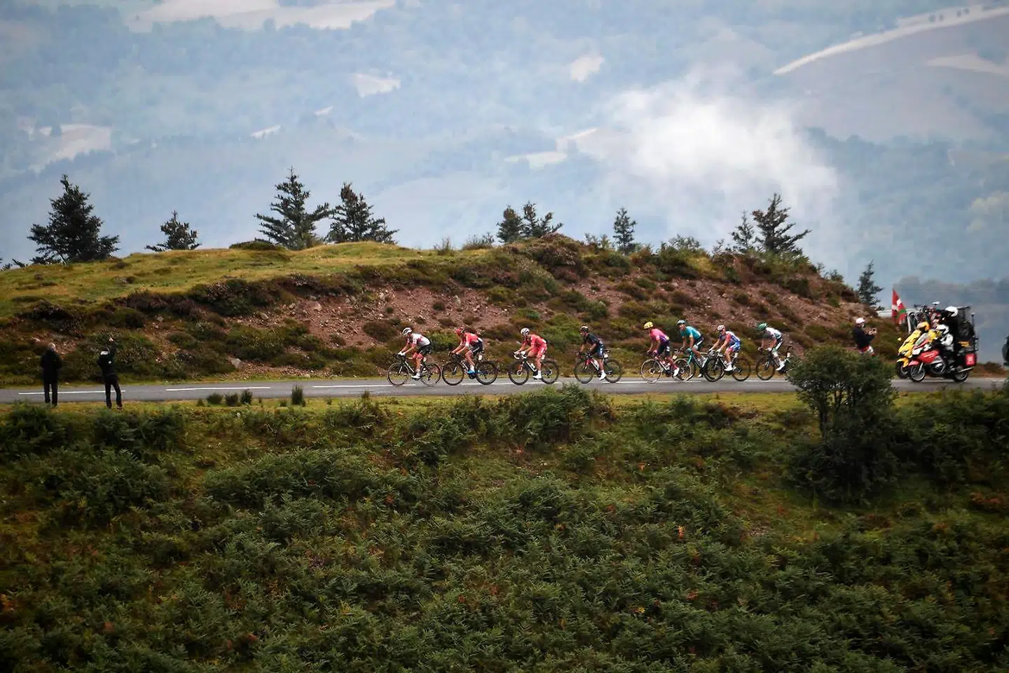 The pack rides during the 9th stage of the 107th edition of the Tour de France cycling race, 154 km between Pau and Laruns, on September 6, 2020. (Photo by Anne-Christine POUJOULAT / AFP)