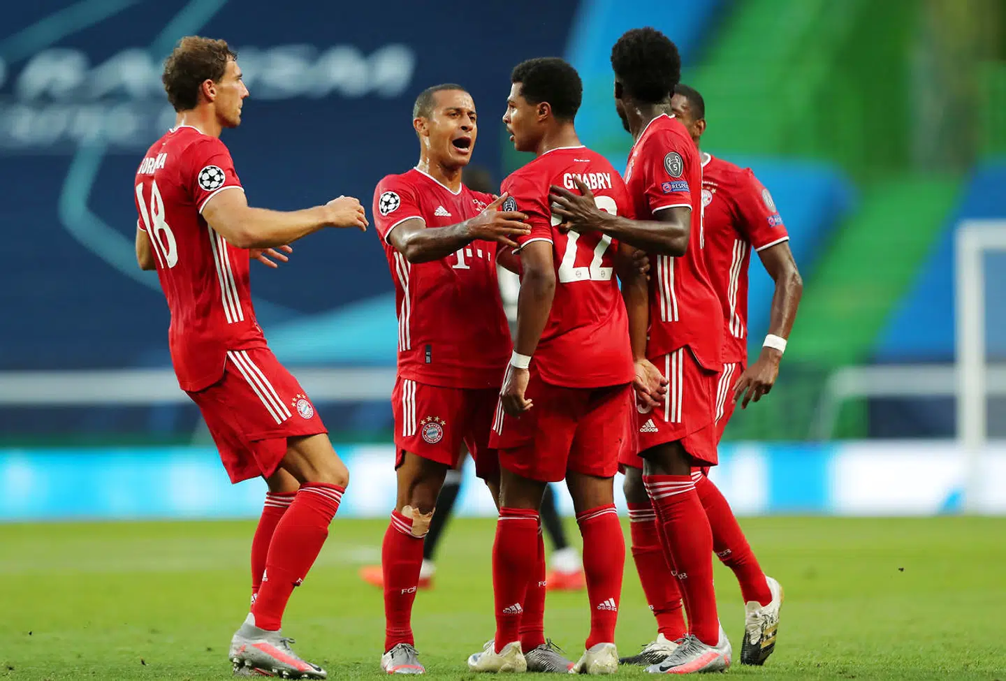 Soccer Football - Champions League Semi Final - Olympique Lyonnais v Bayern Munich - Jose Alvalade Stadium, Lisbon, Portugal - August 19, 2020 Bayern Munich's Serge Gnabry celebrates scoring their first goal with teammates, as play resumes behind closed doors following the outbreak of the coronavirus disease (COVID-19) Miguel A. Lopes/Pool via REUTERS