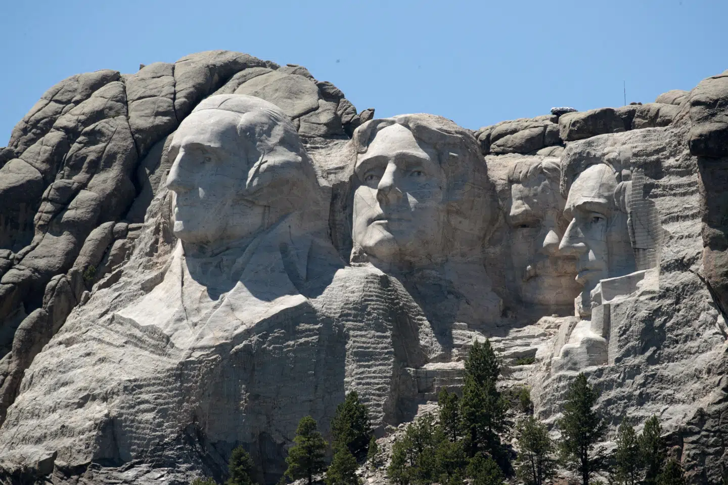 USA's præsident planlægger at skyde fejringen af 4. juli i gang ved monumentet Mount Rushmore, der afbilleder de fire præsidenter George Washington, Thomas Jefferson, Theodore Roosevelt og Abraham Lincoln. (Arkivfoto) Scott Olson/Ritzau Scanpix