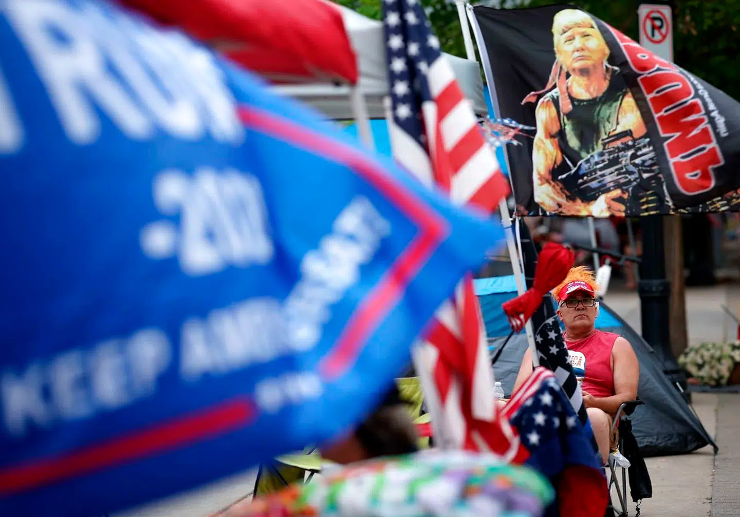 Trump-fans har ligget og siddet i kø i over en uge. De vil være sikre på at komme ind til lørdagens vælgermøde i Tulsa, Oklahoma.