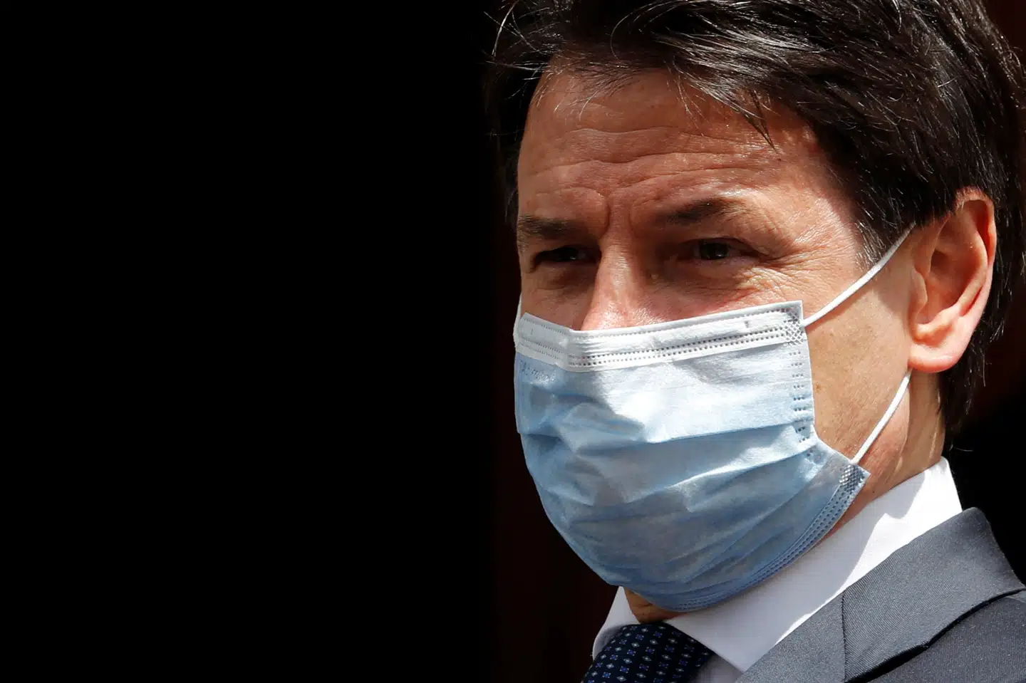 Italiens premierminister, Giuseppe Conte, iført mundbind under coronakrisen. (Arkiv) Remo Casilli/Reuters