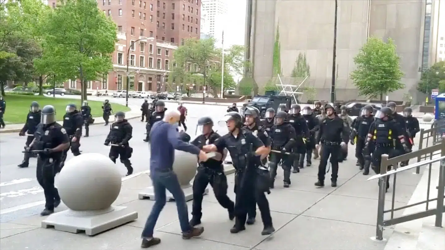An elderly man appears to be shoved by riot police during a protest against the death in Minneapolis police custody of George Floyd, in Buffalo, New York, U.S. June 4, 2020 in this still image taken from video. WBFO/via REUTERS TV ATTENTION EDITORS - NO RESALES.NO ARCHIVES. THIS IMAGE HAS BEEN SUPPLIED BY A THIRD PARTY. MANDATORY CREDIT