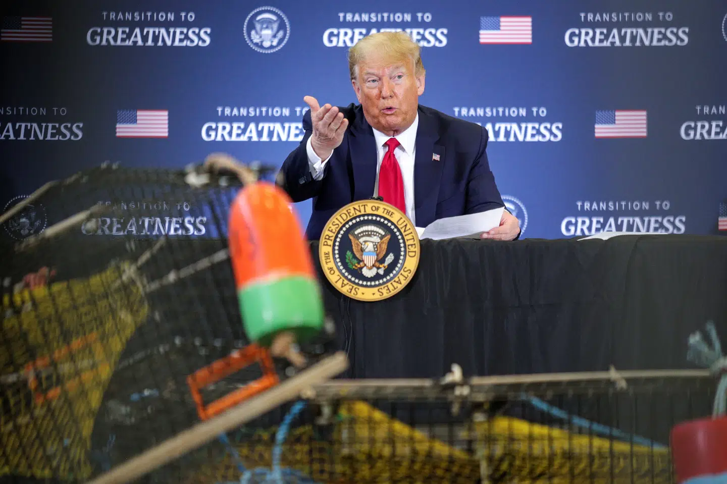 Præsident Trump taler ved et møde om kommercielt fiskeri i Maine fredag. Tom Brenner/Reuters