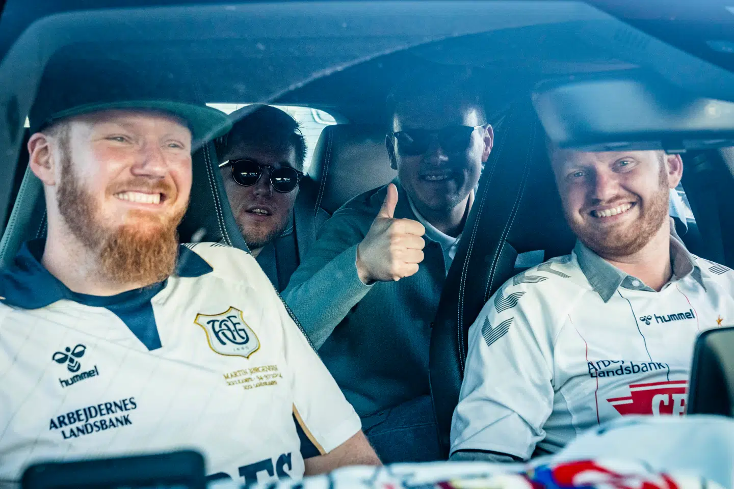 Fire gutter i en bil. Fra venstre: Troels Elbo, Mikael Christiansen, Nicolai Hartmann og Martin Elbo.