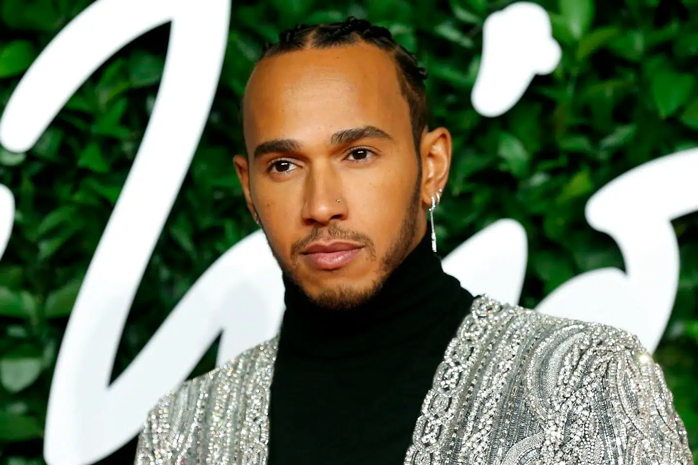Smil, Lewis Hamilton. Ingen har tjent mere end dig.