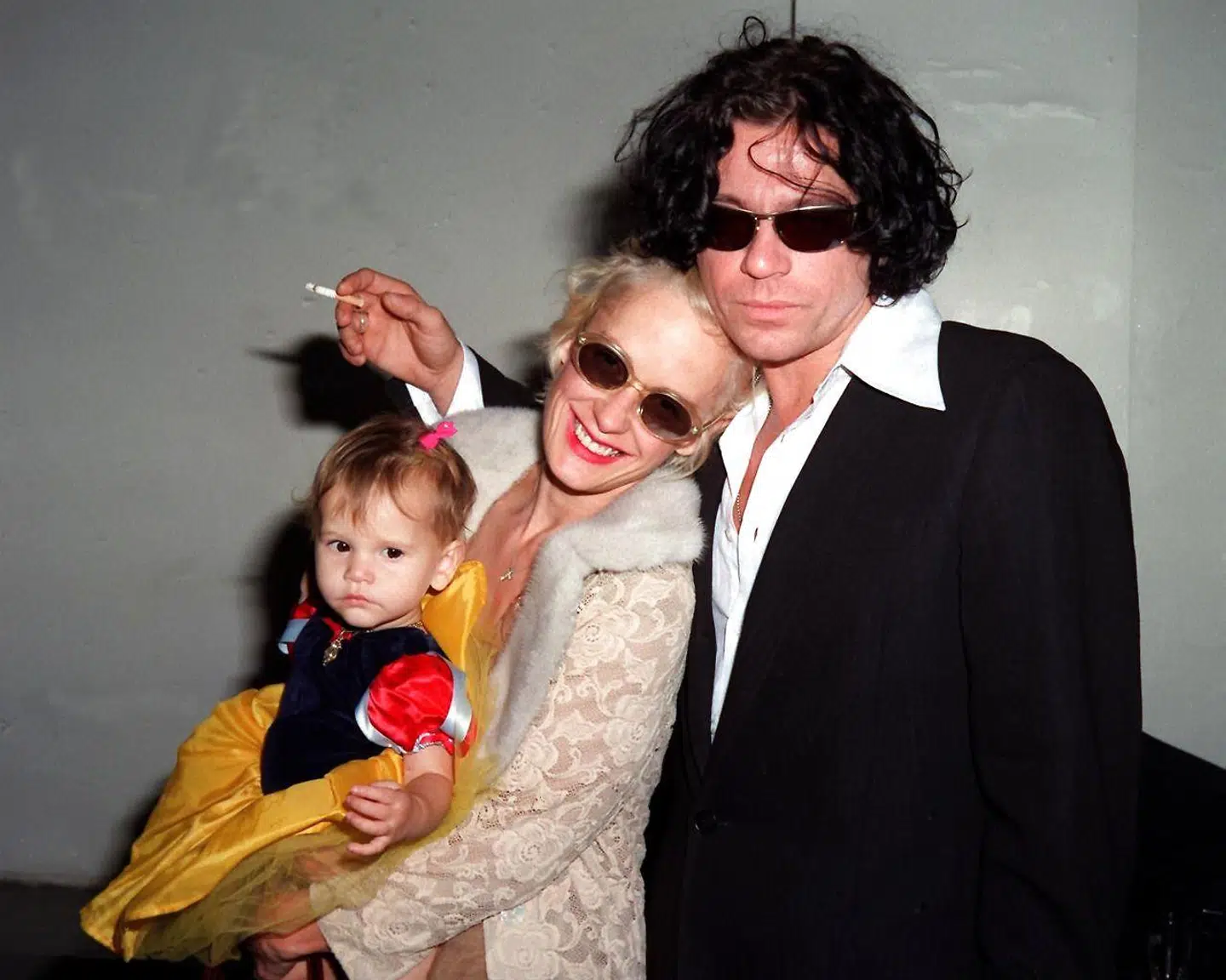 Et øjebliks lykke. Michael Hutchence og Paula Yates med datteren Tiger Lily.