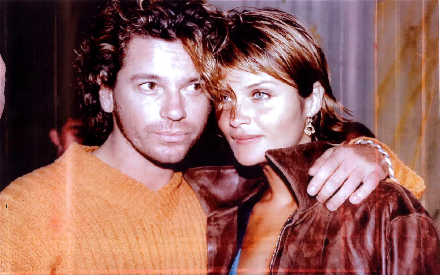 Tiger Lilys far Michael Hutchence med den danske supermodel Helena Christensen, som han var kæreste med, da et overfald ændrede hans liv.