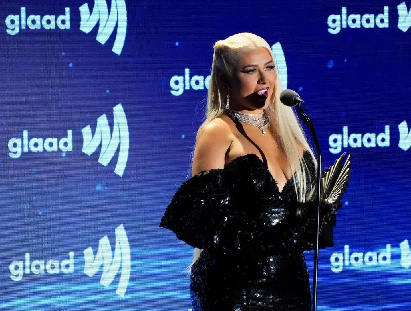 Christina Aguilera, der skal spille på Smukfest til august, er blevet kaldt en 'skrigeskinke' i Ekstra Bladet. Det er over grænsen for, hvad man bør skrive, mener Søren Eskildsen. Foto 2023. REUTERS/Allison Dinner