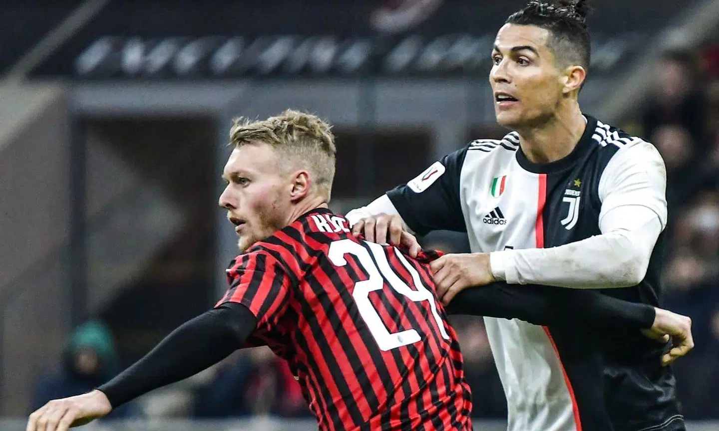 Simon Kjær i duel med Cristiano Ronaldo.