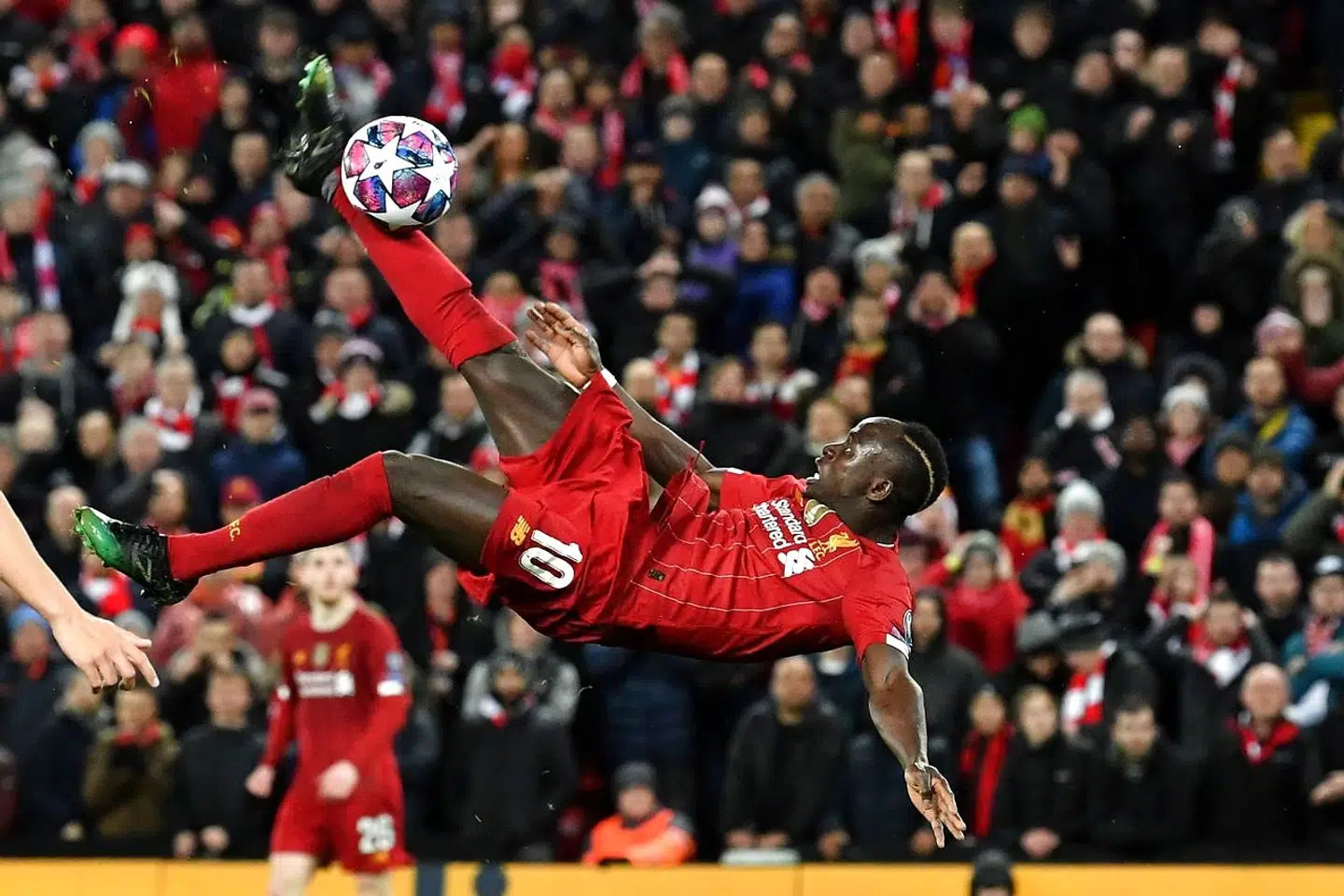 Liverpool's Senegalese striker Sadio Mane's bicycle kick goes over the bar during the UEFA Champions league Round of 16 second leg football match between Liverpool and Atletico Madrid at Anfield in Liverpool, north west England on March 11, 2020. (Photo by Paul ELLIS / AFP)