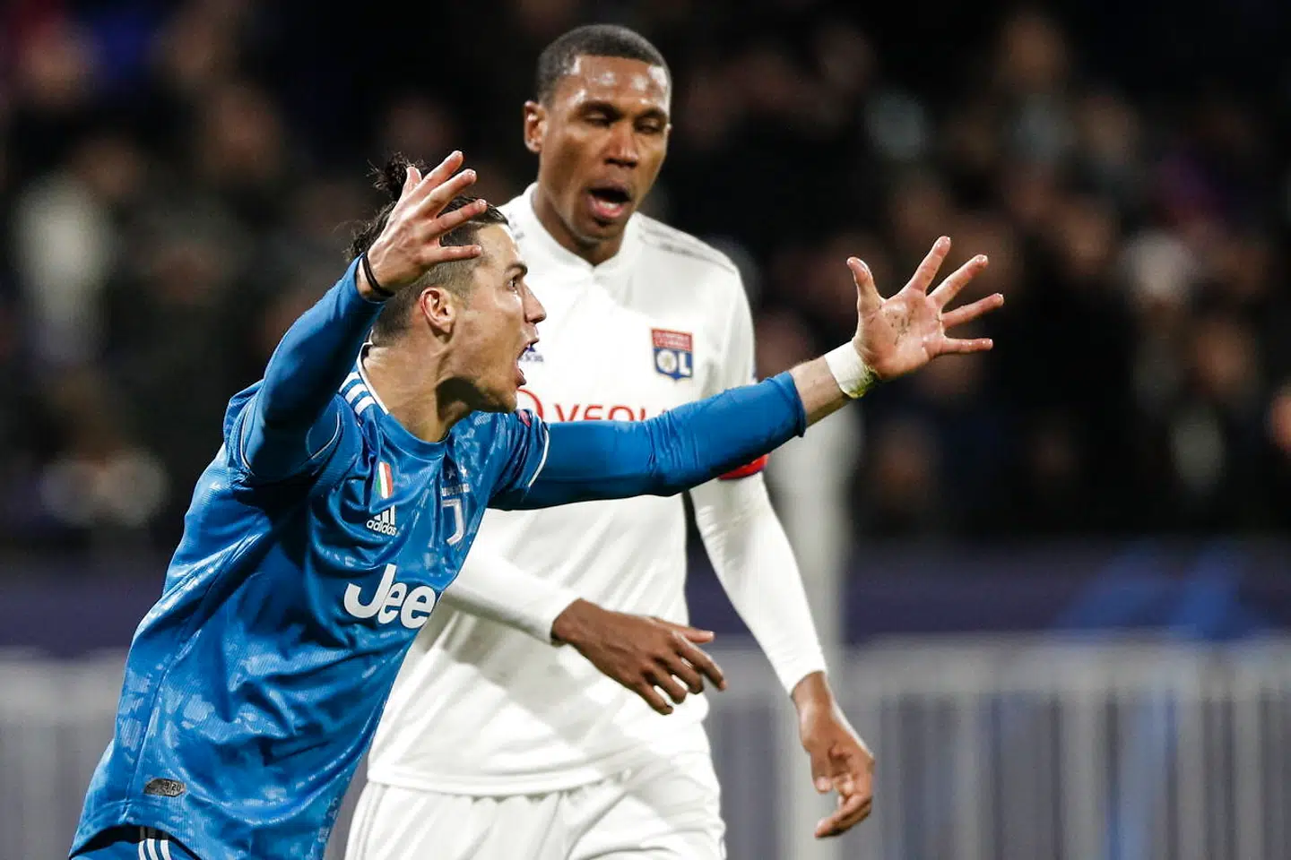 epa08250844 Cristiano Ronaldo of Juventus FC reacts during the UEFA Champions League round of 16 first leg soccer match between Olympique Lyon and Juventus FC in Lyon, France, 26 February 2020. EPA/YOAN VALAT