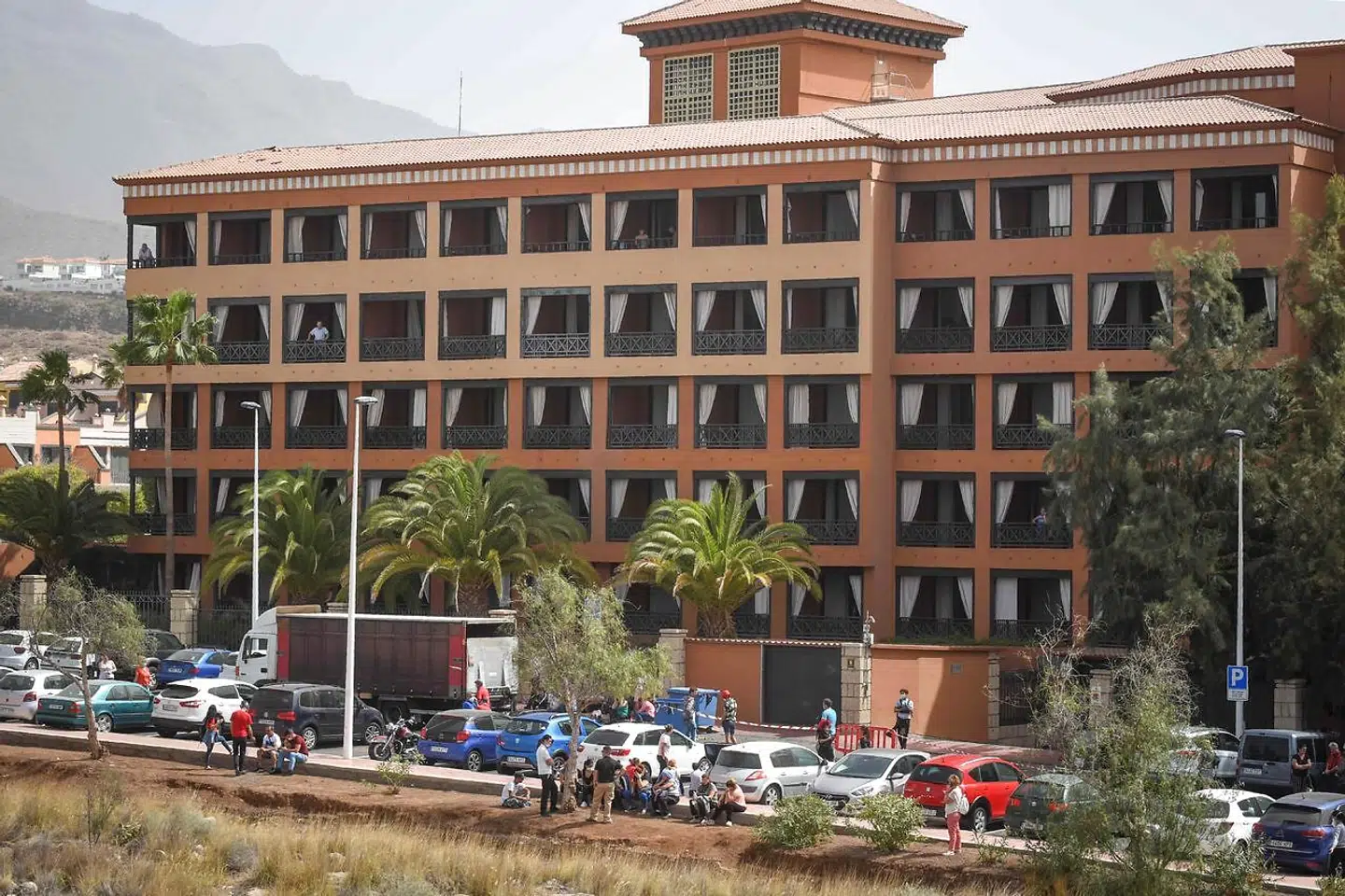General view taken on February 25, 2020 of the H10 Costa Adeje Palace Hotel in La Caleta, where hundreds of people were confined to their rooms after an Italian tourist was hospitalised with a suspected case of coronavirus. - Tourists staying in a four-star hotel on the Spanish island of Tenerife, in the Canary archipielago, were confined to their rooms today following the announcement of a suspected novel coronavirus, COVID-19, case waiting for official confirmation. This possible case was detected yesterday in Tenerife, where an Italian national passed a first test which turned out to be positive, announced the Spanish Ministry of Health. (Photo by DESIREE MARTIN / AFP)
