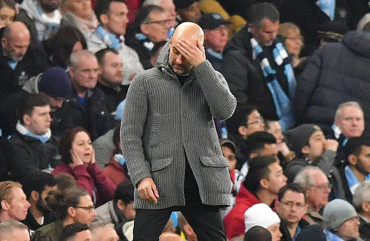 (FILES) In this file photo taken on April 17, 2019 Manchester City's Spanish manager Pep Guardiola reacts during the UEFA Champions League quarter final second leg football match between Manchester City and Tottenham Hotspur at the Etihad Stadium in Manchester, north west England. - Manchester City said they would appeal to the Court of Arbitration for Sport after being hit with a two-season ban from European competition on Friday, February 14. (Photo by Anthony Devlin / AFP)