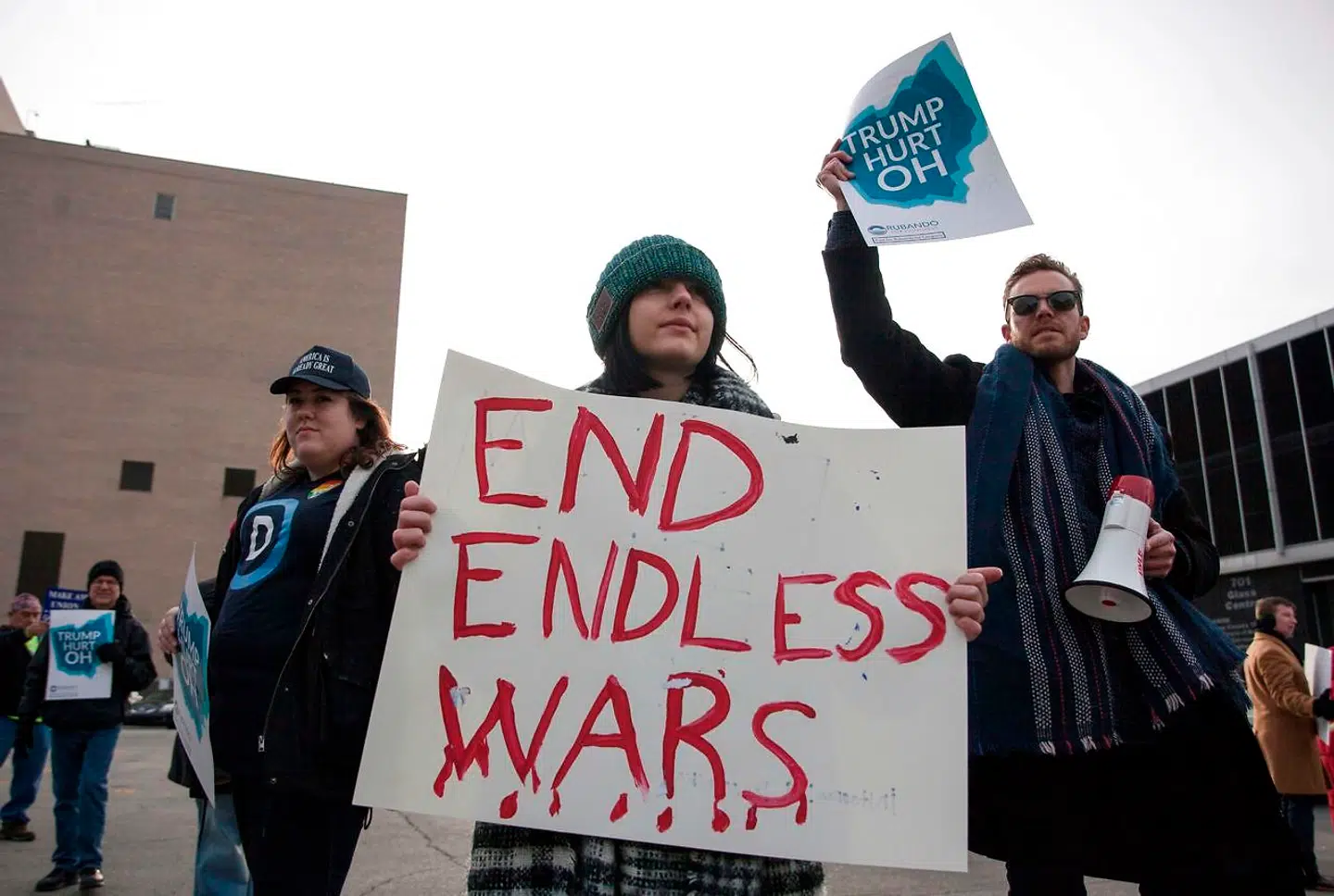 Protesters gather near the Huntington Center in Toledo, Ohio January 9, 2020 where U.S. President Donald Trump is holding his first campaign rally of the year. - Protesters gathered to protest against U.S. President Donald Trumps policies and a war with Iran. (Photo by Seth HERALD / AFP)