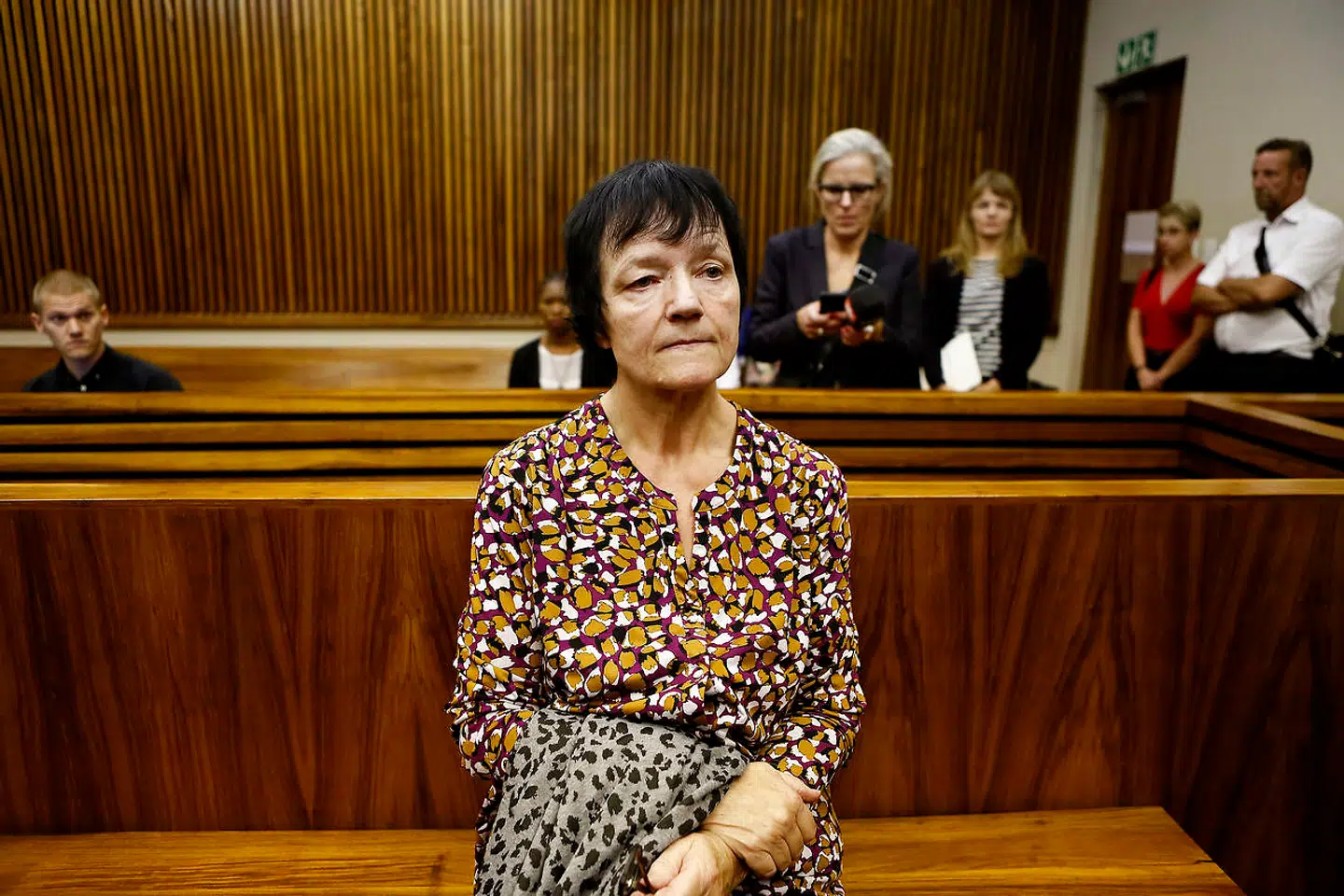 (ARKIV) Anna Britta Troelsgaard Nielsen leaves the court room at the Randburg Magistrate Court on November 8, 2018 in Johannesburg, South Africa. Anna Britta Troelsgaard Nielsen is accused of embezzlement to an extent of around 111 million danish kroner. Endnu en gang er Danmark øverst på anti-korruptionsliste, men mister for femte år i træk point. Det kan blandt andet skyldes manglende politisk åbenhed. Det skriver Ritzau, torsdag den 23. januar 2020.. (Foto: PHILL MAGAKOE/Ritzau Scanpix)
