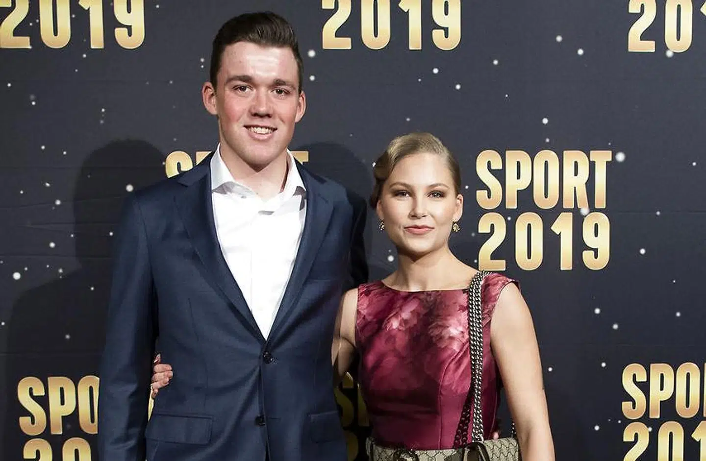 Mads Pedersen sammen med hustruen Lisette på den 'gyldne' løber.