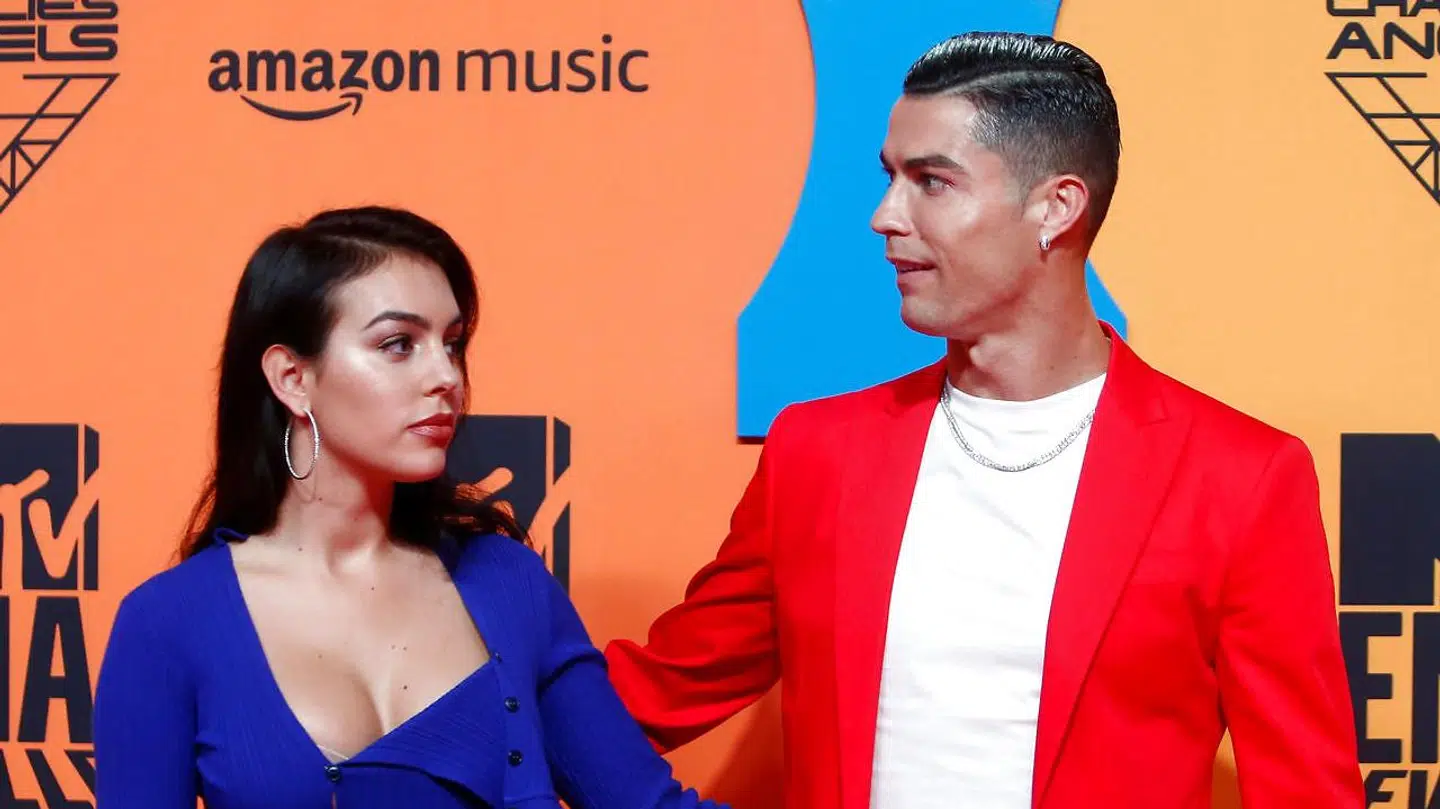 Cristiano Ronaldo and Georgina Rodriguez pose on a red carpet as they arrive at the 2019 MTV Europe Music Awards at the FIBES Conference and Exhibition Centre in Seville, Spain, November 3, 2019. REUTERS/Jon Nazca