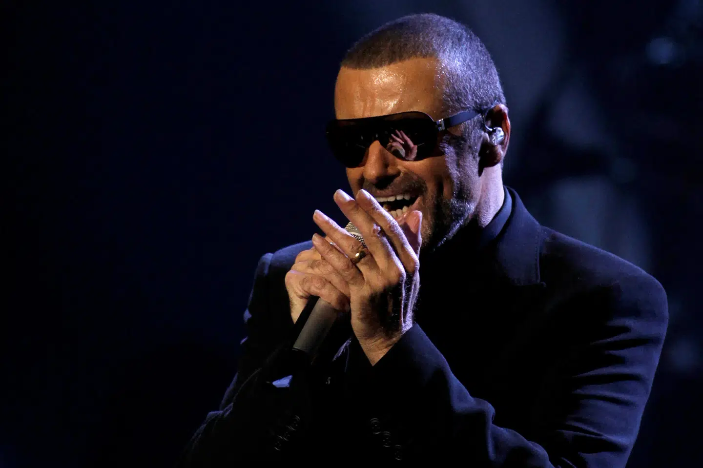 George Michael under en koncert i 2011. Sangeren døde i en alder af 53 år den 25. december 2016. Præcis tre år efter døde også hans søster. David W Cerny/Reuters