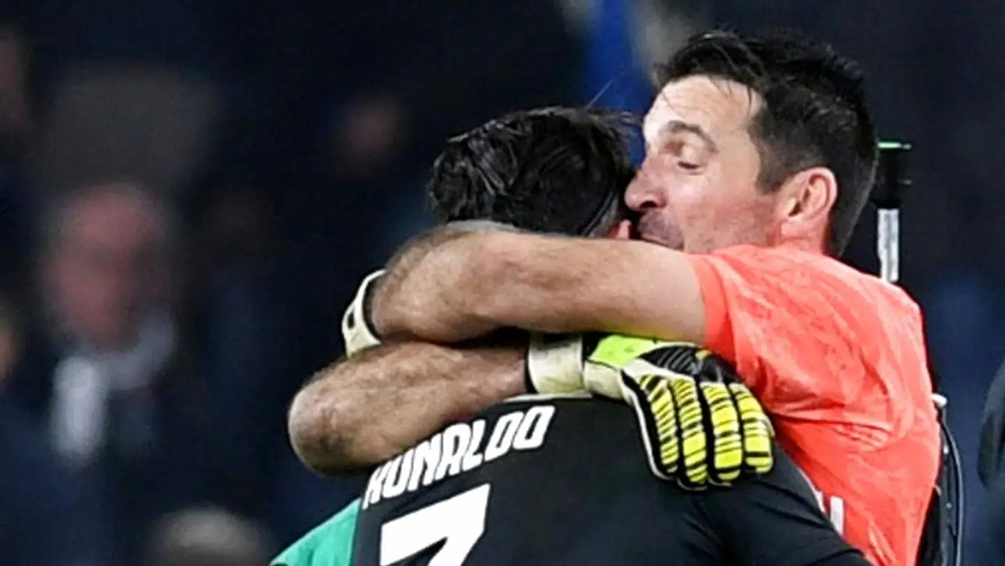 Soccer Football - Serie A - Sampdoria v Juventus - Stadio Comunale Luigi Ferraris, Genoa Italy - December 18, 2019 Juventus' Cristiano Ronaldo and Gianluigi Buffon celebrate after the match REUTERS/Jennifer Lorenzini