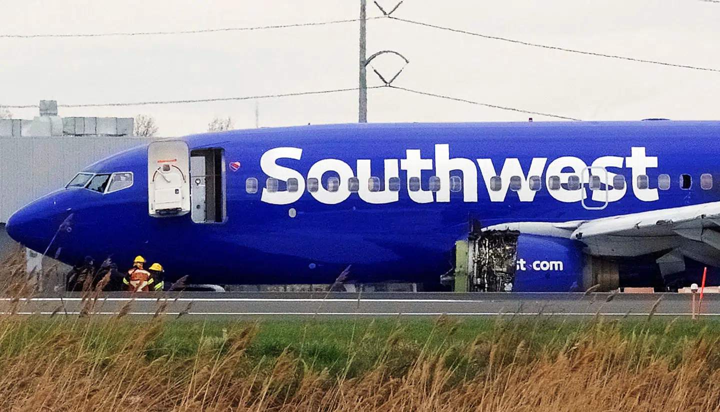 FILE PHOTO: Emergency personnel monitor the damaged engine of Southwest Airlines Flight 1380, which diverted to the Philadelphia International Airport after the airline crew reported damage to one of the aircraft's engines, on a runway in Philadelphia, Pennsylvania U.S. April 17, 2018. REUTERS/Mark Makela/File Photo