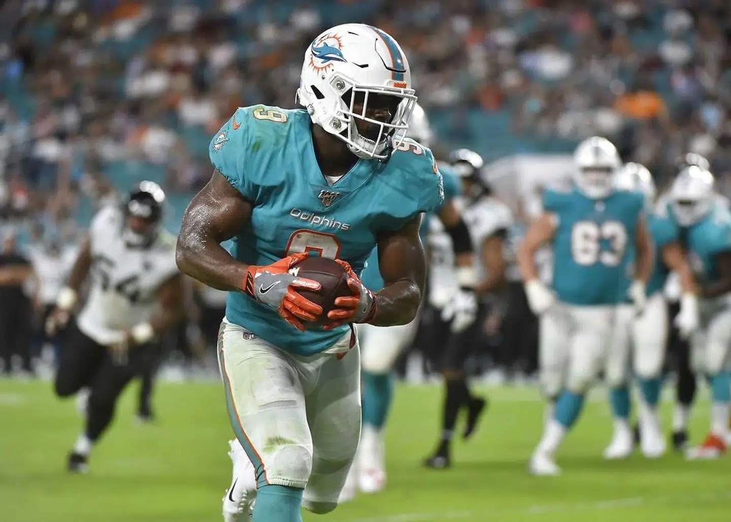 Mark Walton her i aktion for Dolphins er muligvis helt færdig i NFL.
