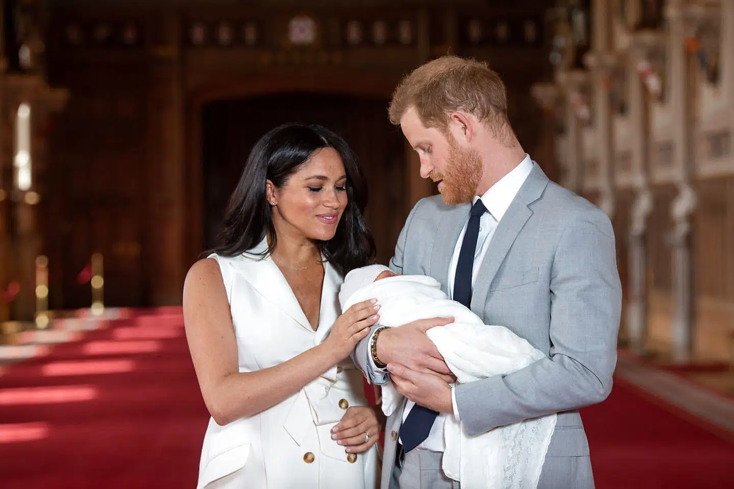 Prins Harry, Meghan Markle og deres lille søn, som parret blev forældre til i maj i år.