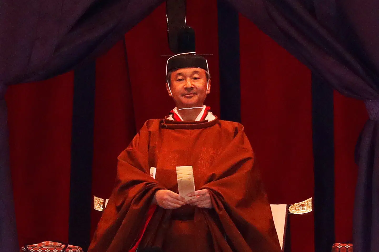 Selv om kejseren ikke har politisk magt i Japan, så spiller kejserfamiliens 2700 år lange historie og kejserfiguren en stor symbolsk rolle. Derfor har tirsdagens ceremoni enormt stor opmærksomhed i Japan. Issei Kato/Reuters