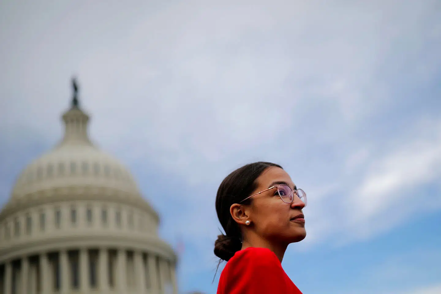 Democratic Representative-elect Alexandria Ocasio-Cortez of New York arrives for a class photo with incoming newly-elected members of the U.S. House of Representatives on Capitol Hill in Washington, U.S., November 14, 2018. REUTERS/Carlos Barria