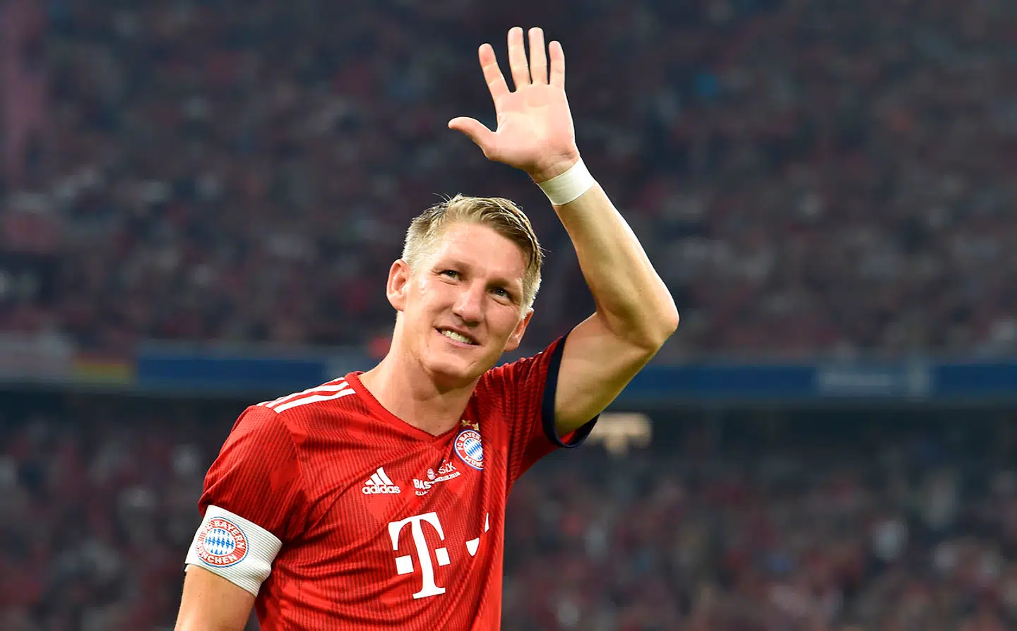 Former Bayern Munich's midfielder Bastian Schweinsteiger waves during he come for the second time of his farewell match for Bastian Schweinsteiger between his former teams FC Bayern Munich and Chicago Fire in the stadium in Munich, southern Germany, on August 28, 2018. Christof STACHE / AFP
