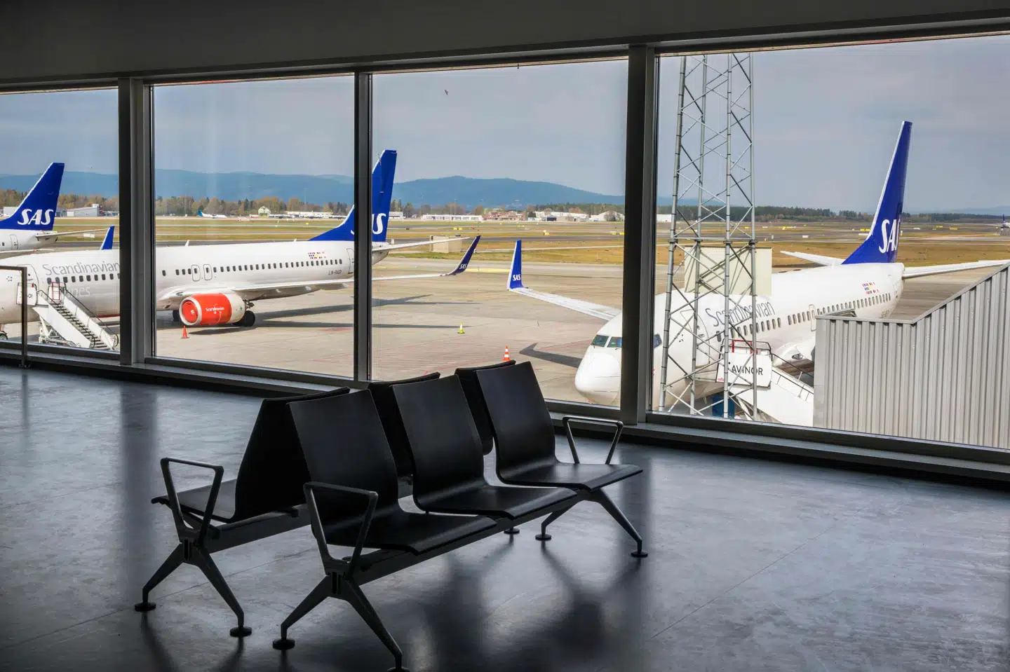 SAS Norge Kabinforening samt Norwegian Kabineforening beretter om et stigende problem med passagerer, der drikker medbragt alkohol på flyet. (Arkivfoto). Ole Berg-Rusten/Ritzau Scanpix