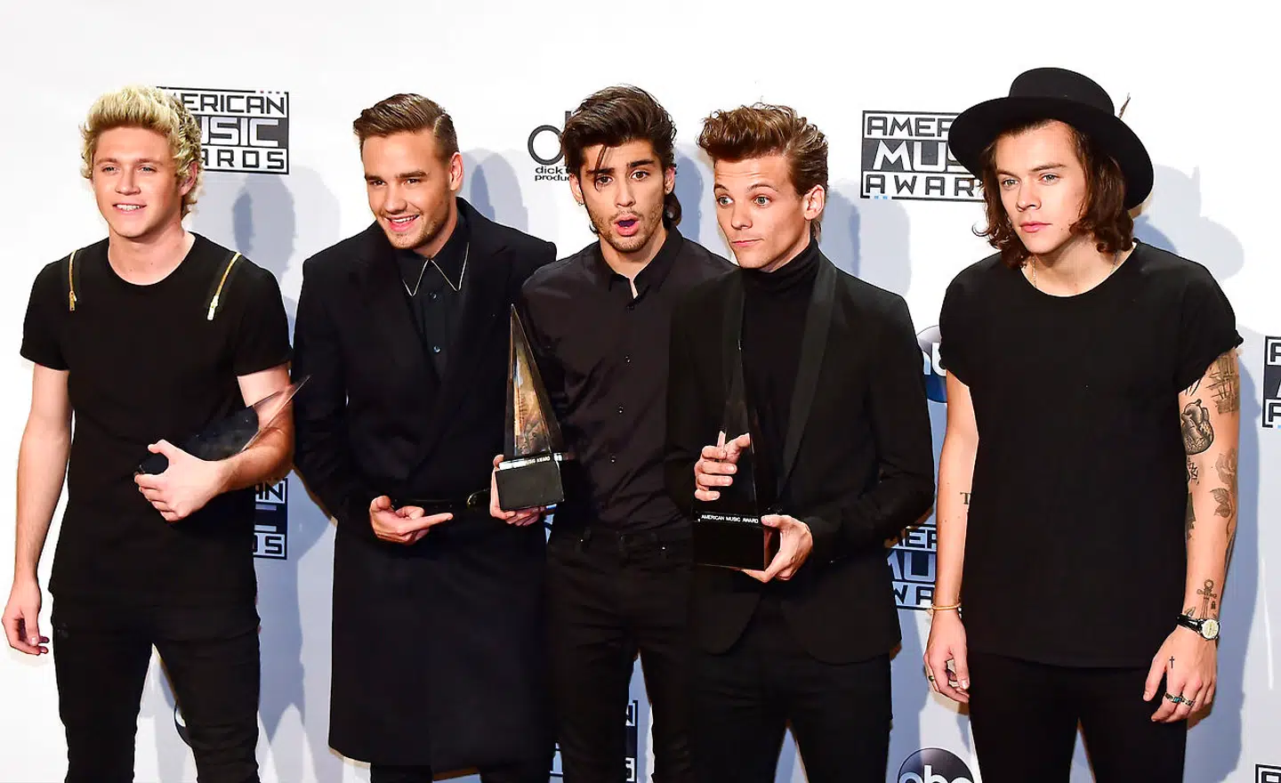 Arkivfoto fra 2014, hvor man kan se medlemmerne i One Direction samlet. Fra højre ses Niall Horan, Liam Payne, Zayn Malik, Louis Tomlinson og Harry Styles. AFP PHOTO/FREDERIC J. BROWN. FREDERIC J. BROWN / AFP