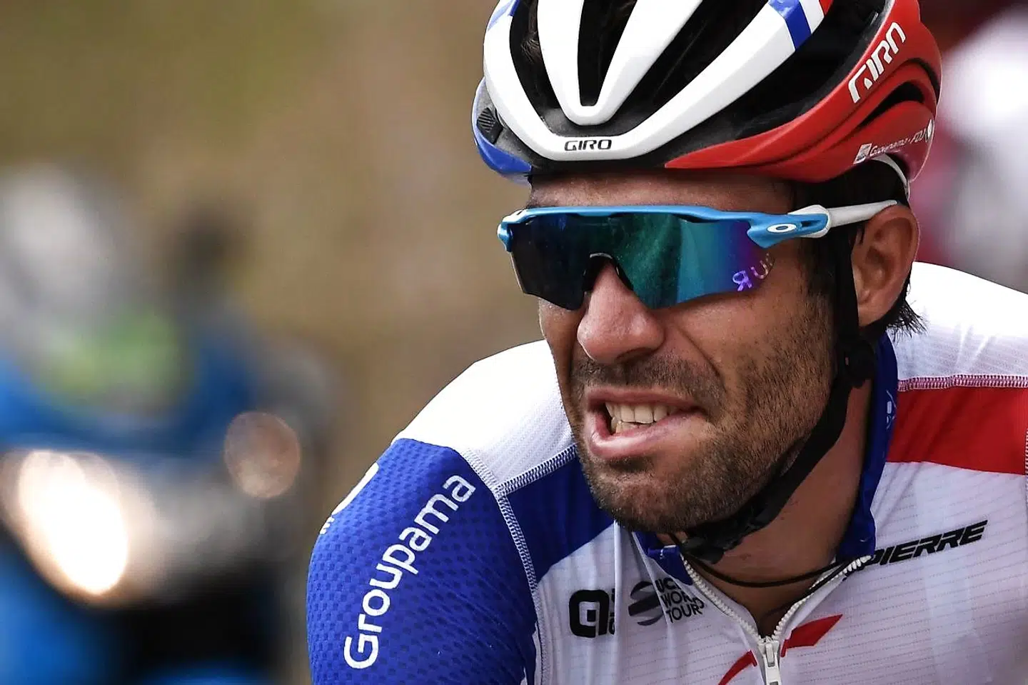 France's Thibaut Pinot reacts as he cycles few moments before quitting the Tour de France due to a thigh problem during the nineteenth stage of the 106th edition of the Tour de France cycling race between Saint-Jean-de-Maurienne and Tignes, in Tignes, on July 26, 2019. (Photo by Marco Bertorello / AFP)