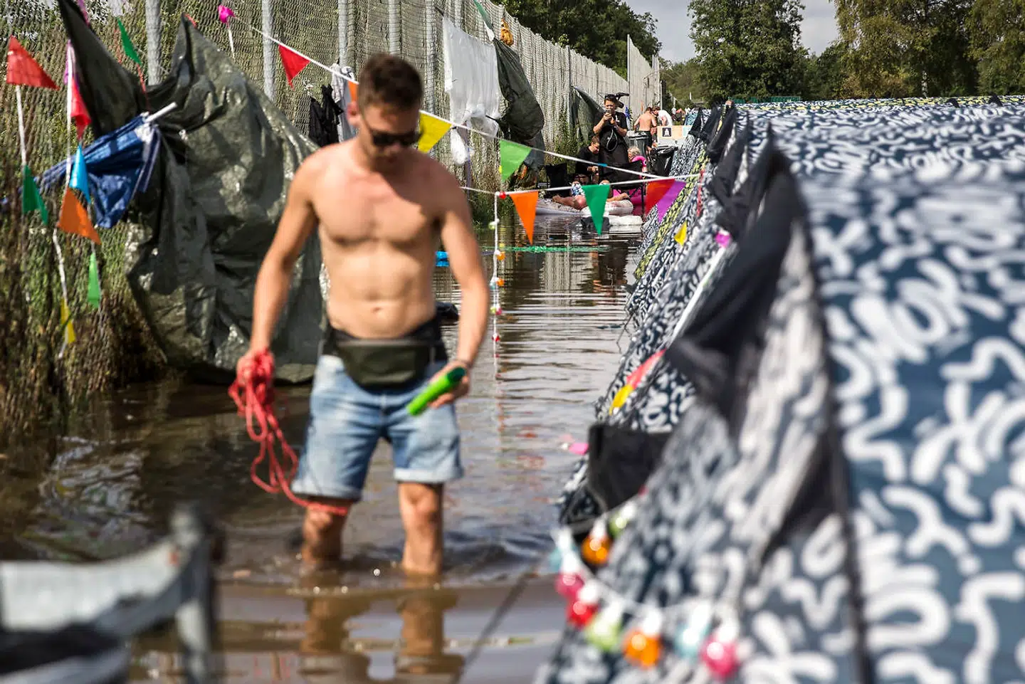 Massivt skybrud sætter telte under vand på campingområdet ved Sølund på Smukfest lørdag den 10. august 2019.. (Foto: Mikkel Berg Pedersen/Ritzau Scanpix)