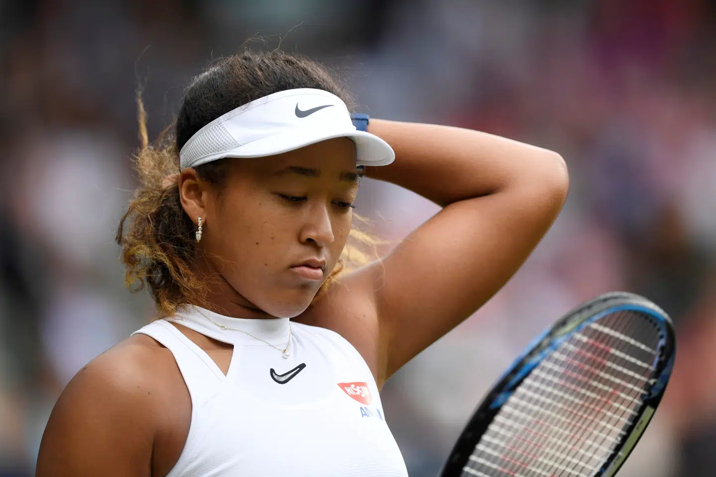 Naomi Osaka måtte senest se sig besejret i Wimbledons første runde af Yulia Putintseva. Tony O'Brien/Reuters