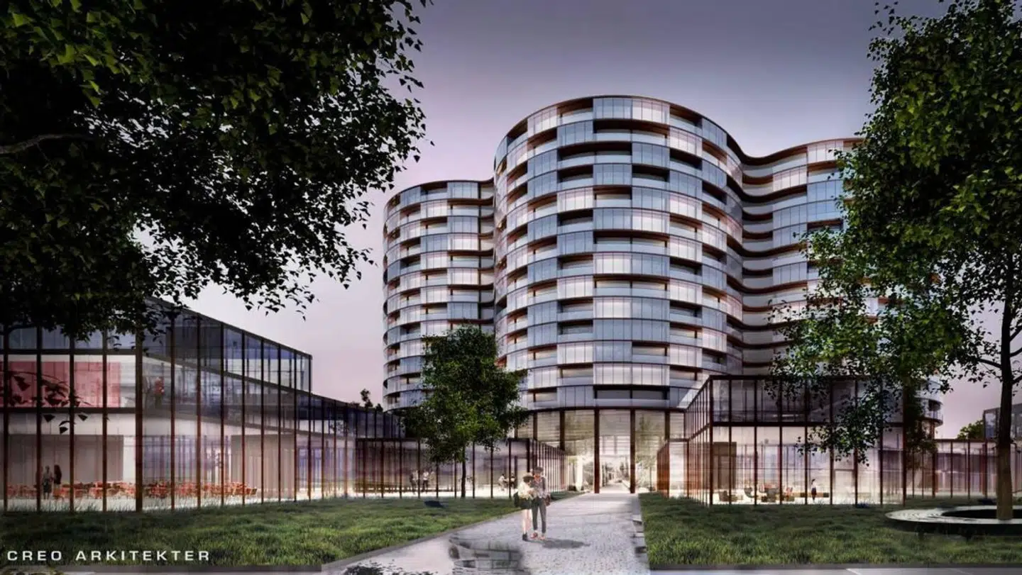 Illustration af det kommende hotel i Billund Ø set fra syd, hvorfra der bliver indgang til forlystelsespark og parkeringsanlæg længere mod syd.
