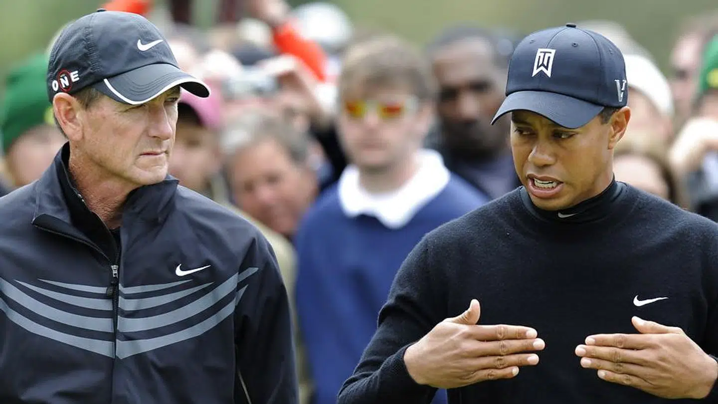 Tiger Woods (th.) med Hank Haney.