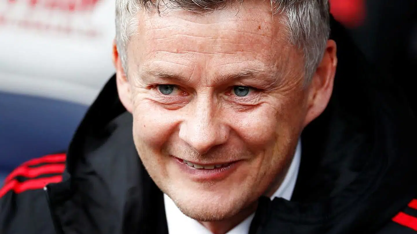 Ole Gunnar Solskjær smilede under søndagens kamp.