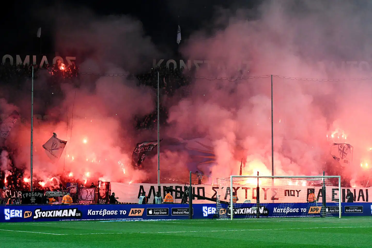 Soccer Football - Greek Superleague - PAOK Salonika v Olympiacos - Toumba Stadium, Thessaloniki, Greece - February 10, 2019 PAOK Salonika fans set off flares during the match REUTERS/Alexandros Avramidis
