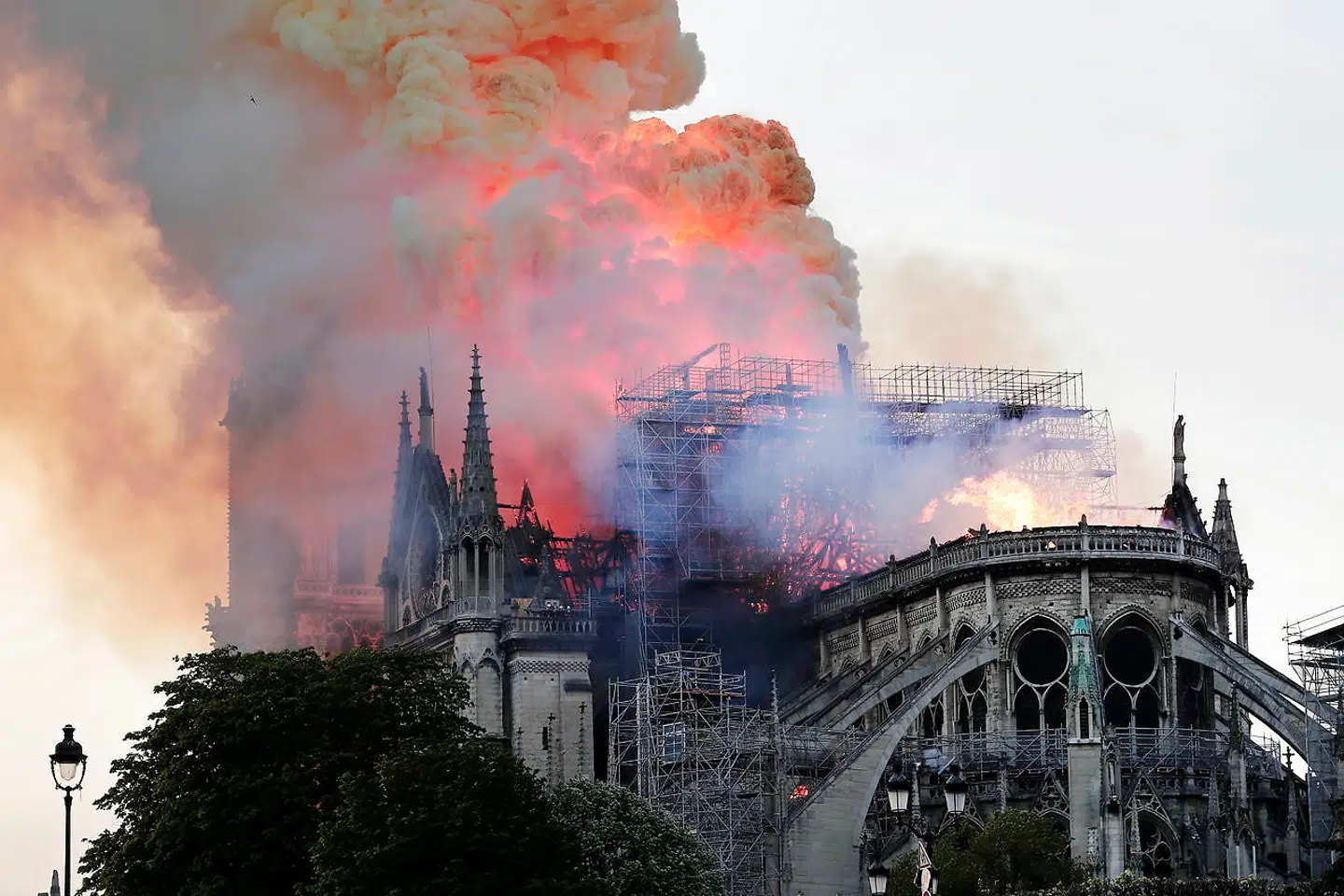 epa07508972 Flames on the roof of the Notre-Dame Cathedral in Paris, France, 15 April 2019. A fire started in the late afternoon in one of the most visited monuments of the French capital. EPA/IAN LANGSDON