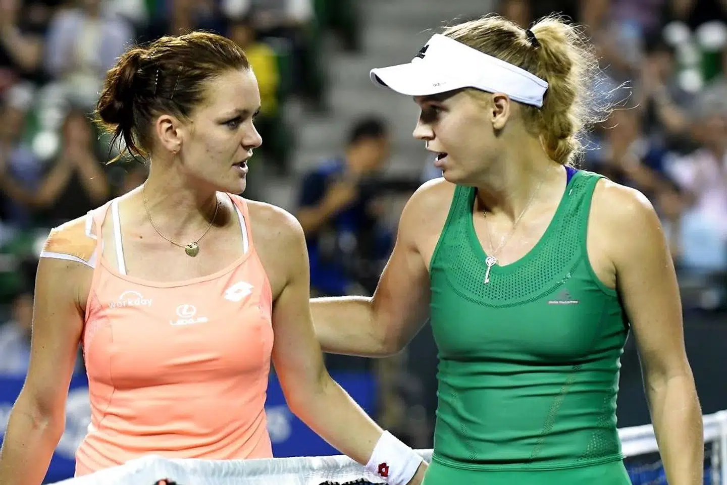 Rivaler og veninder: Wozniacki og Radwanska efter en kamp i 2016.