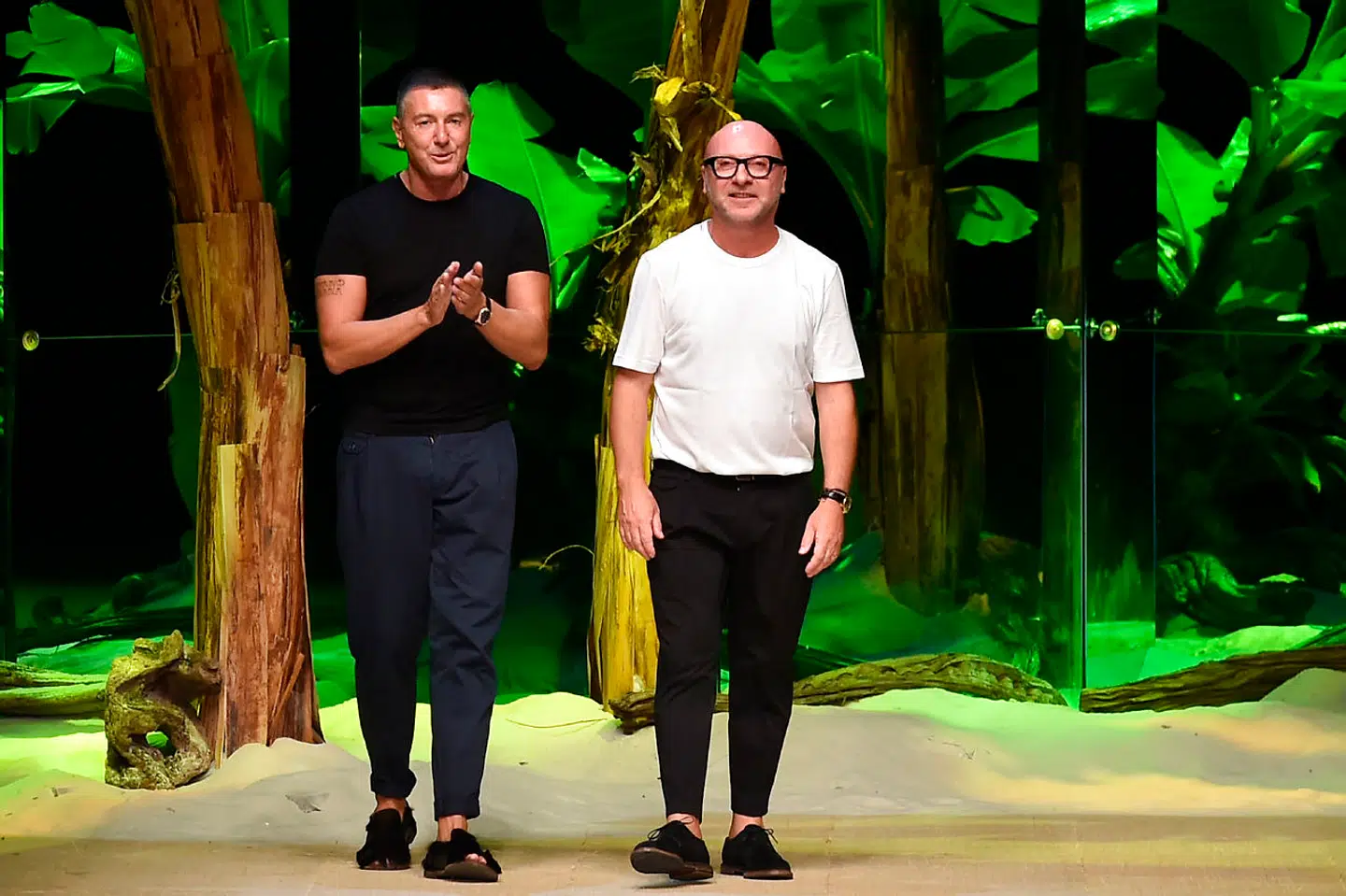 Domenico Dolce (th.) og Stefano Gabbana. ALBERTO PIZZOLI / AFP