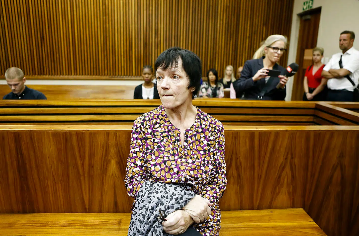 Anna Britta Troelsgaard Nielsen leaves the court room at the Randburg Magistrate Court on November 8, 2018 in Johannesburg, South Africa. Anna Britta Troelsgaard Nielsen is accused of embezzlement to an extent of around 111 million danish kroner. (Photo by Phill Magakoe / AFP)