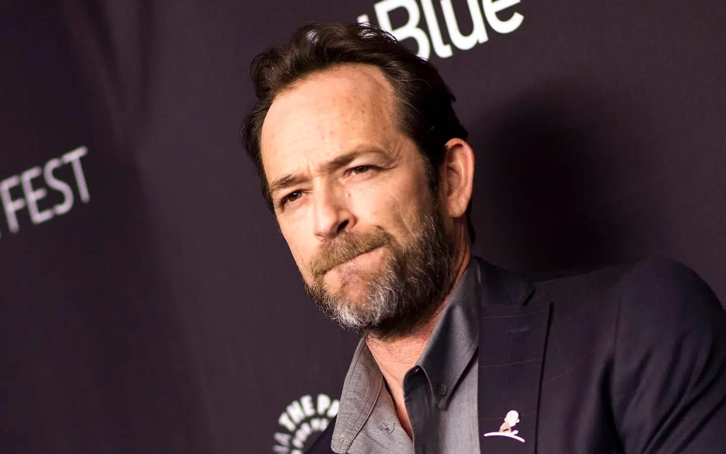 (FILES) In this file photo taken on March 25, 2018 Actor Luke Perry attends The 2018 PaleyFest screening of "Riverdale" at the Dolby Theater in Hollywood, California. - Actor Luke Perry has been hospitalized after reportedly suffering a massive stroke, US media said February 28, 2019. The "Beverly Hills, 90210" star was rushed to the hospital on Wednesday and remains under observation, his representative told various media outlets, declining to elaborate on the actor's condition. Perry, 52, had been in Los Angeles working on the television series "Riverdale, " a comic book adaptation in which he plays Fred Andrews. (Photo by VALERIE MACON / AFP)