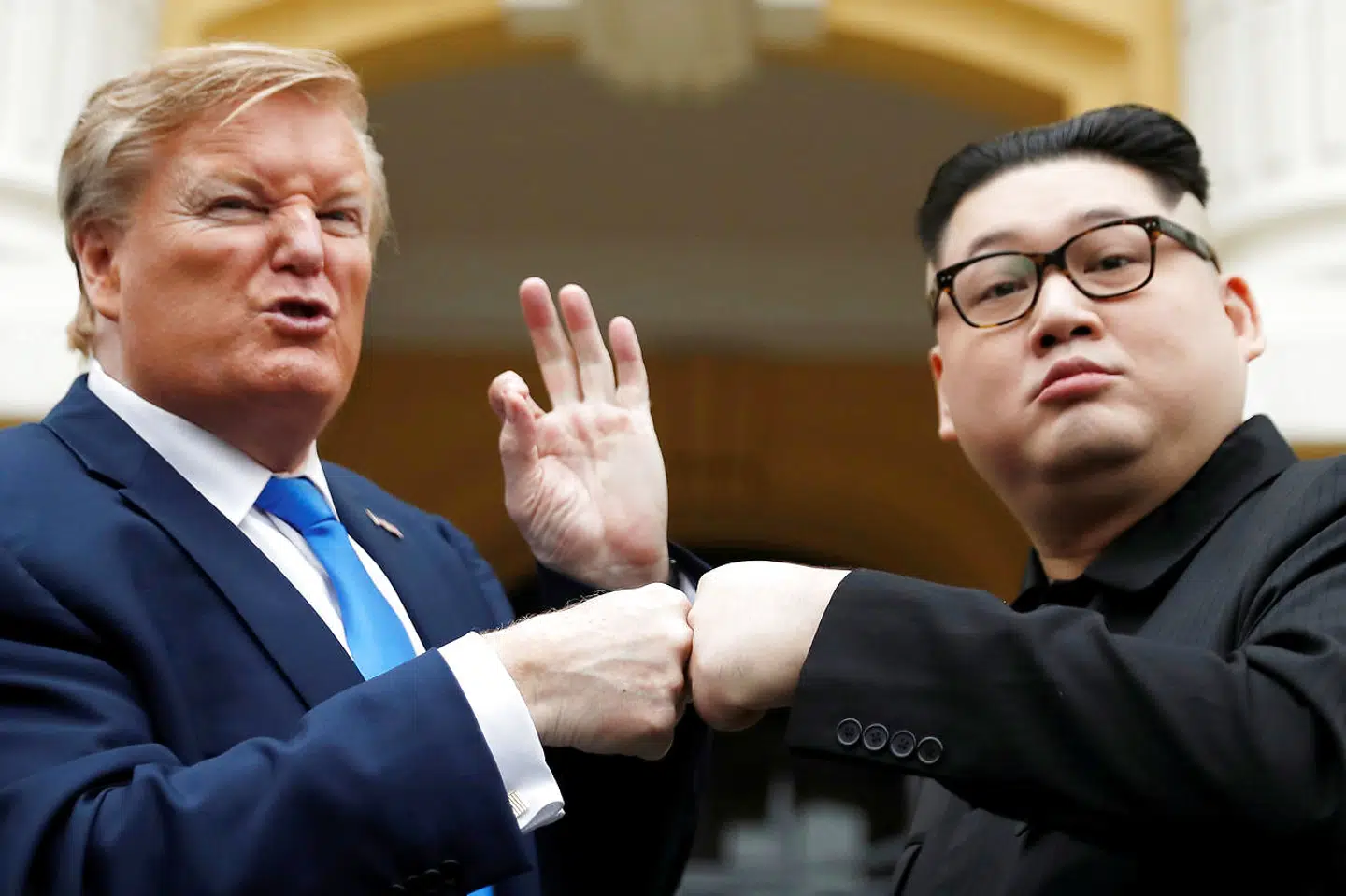 Howard X, an Australian-Chinese impersonator of North Korean leader Kim Jong Un and Russell White, who is impersonating U.S. President Donald Trump, pose for a photo outside the Opera House, ahead of the upcoming Trump-Kim summit in Hanoi, Vietnam, February 22, 2019. REUTERS/Jorge Silva