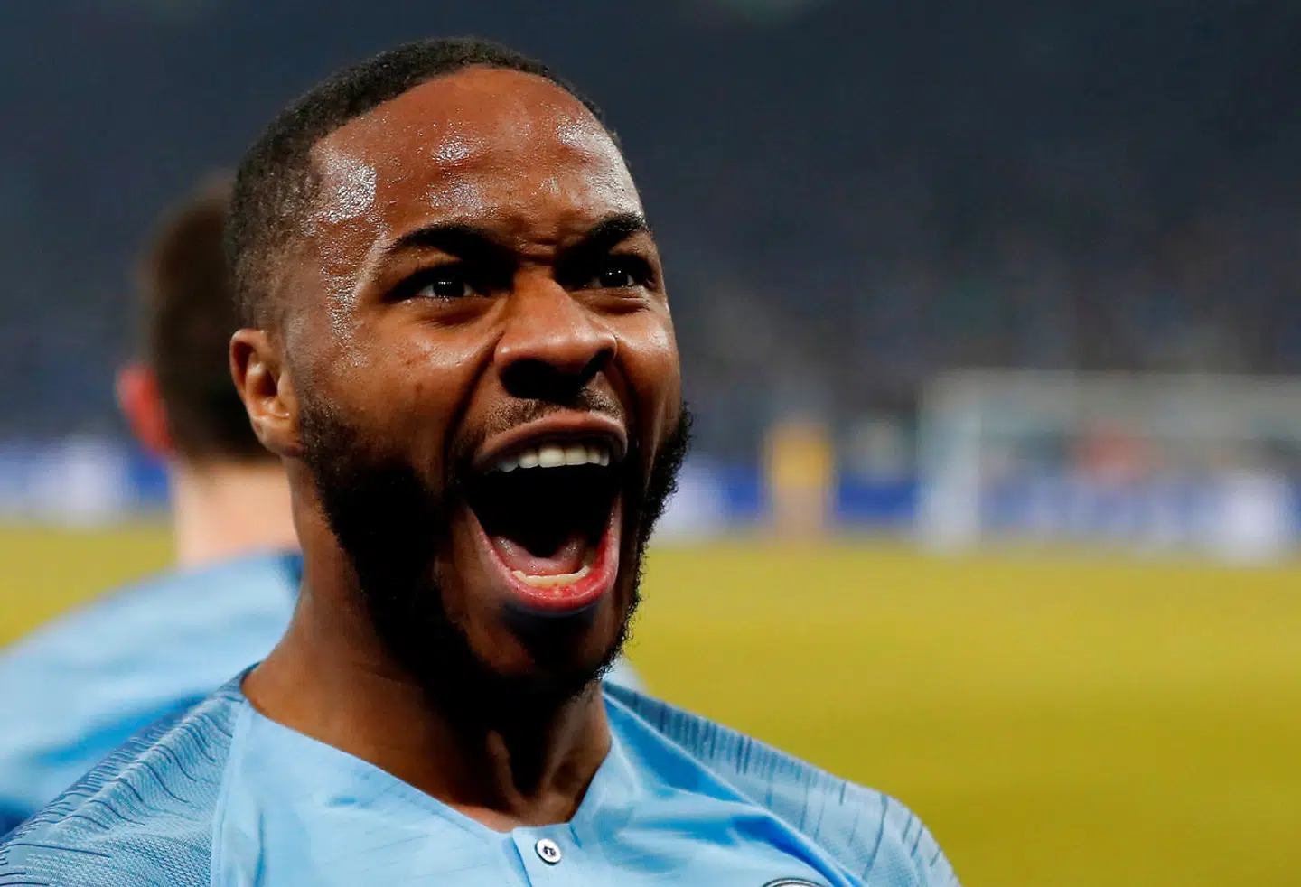 Soccer Football - Champions League - Round of 16 First Leg - Schalke 04 v Manchester City - Veltins-Arena, Gelsenkirchen, Germany - February 20, 2019 Manchester City's Raheem Sterling celebrates scoring their third goal Action Images via Reuters/Matthew Childs