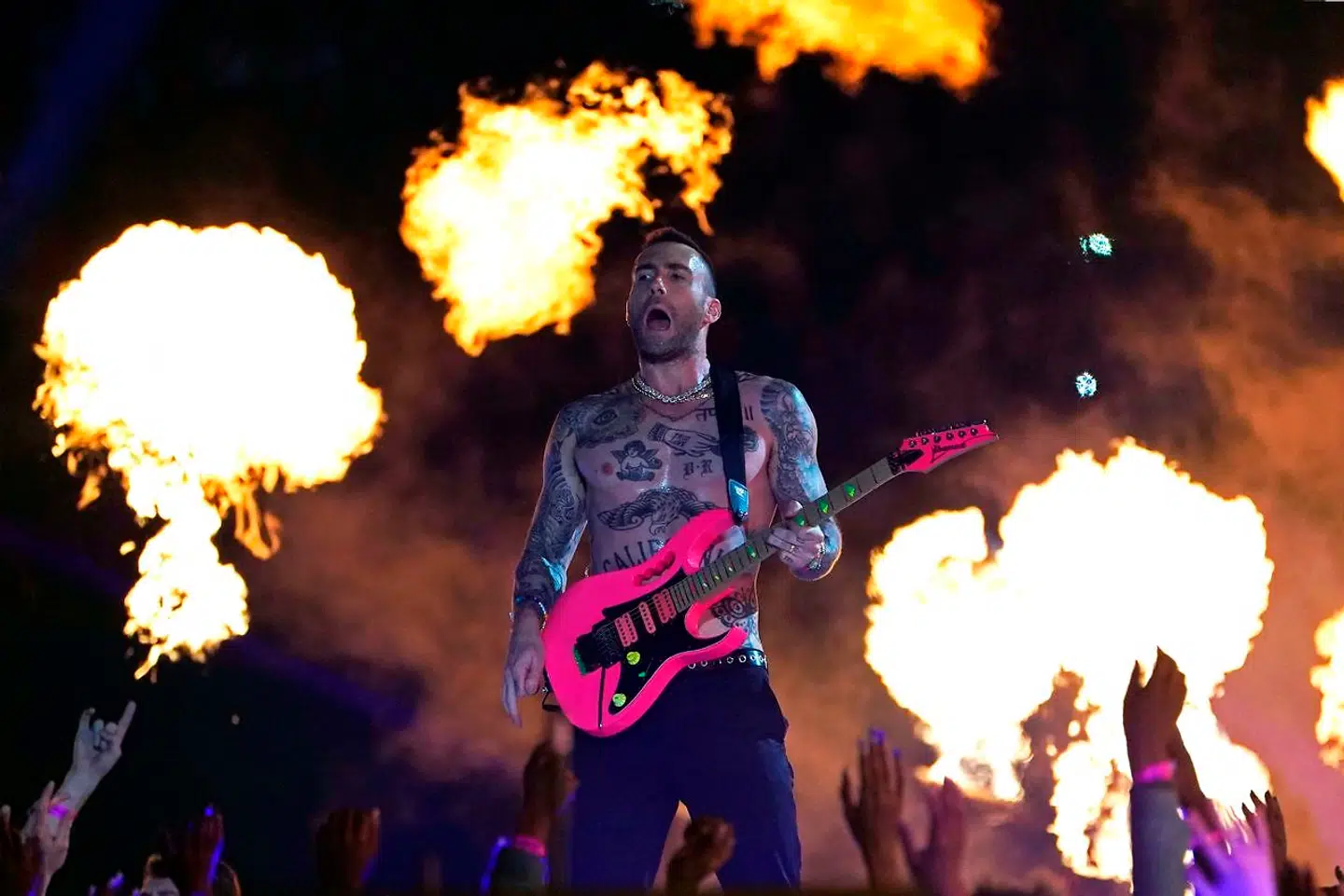 TOPSHOT - Lead vocalist of Maroon 5 Adam Levine performs during the halftime show of Super Bowl LIII between the New England Patriots and the Los Angeles Rams at Mercedes-Benz Stadium in Atlanta, Georgia, on February 3, 2019. (Photo by TIMOTHY A. CLARY / AFP)