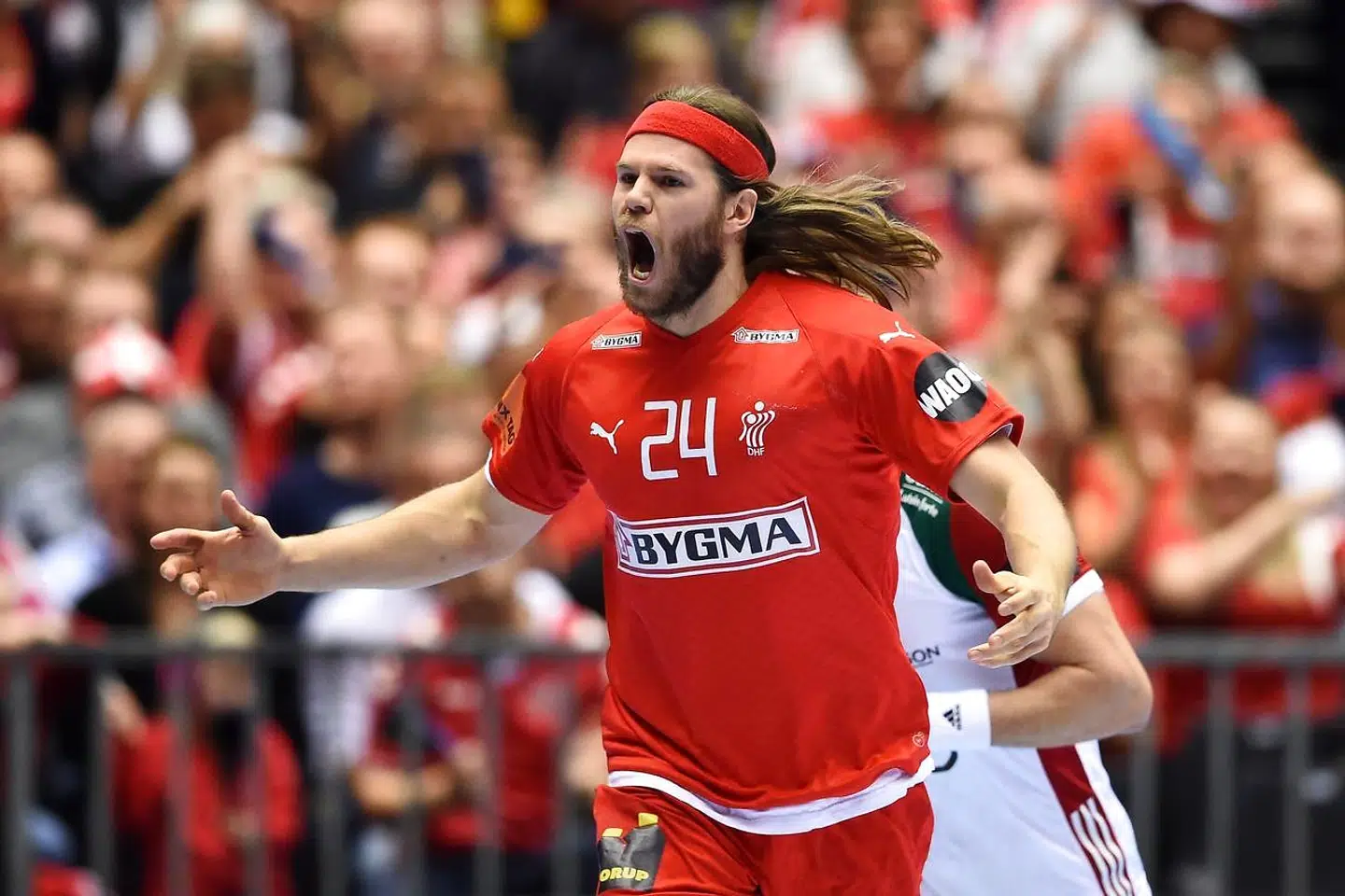 Denmark's Mikkel Hansen celebrates after scoring during the IHF Men's World Championship 2019 Group II handball match between Denmark and Hungary at the Jyske Bank Boxen arena in Herning on January 19, 2019. (Photo by Jonathan NACKSTRAND / AFP)