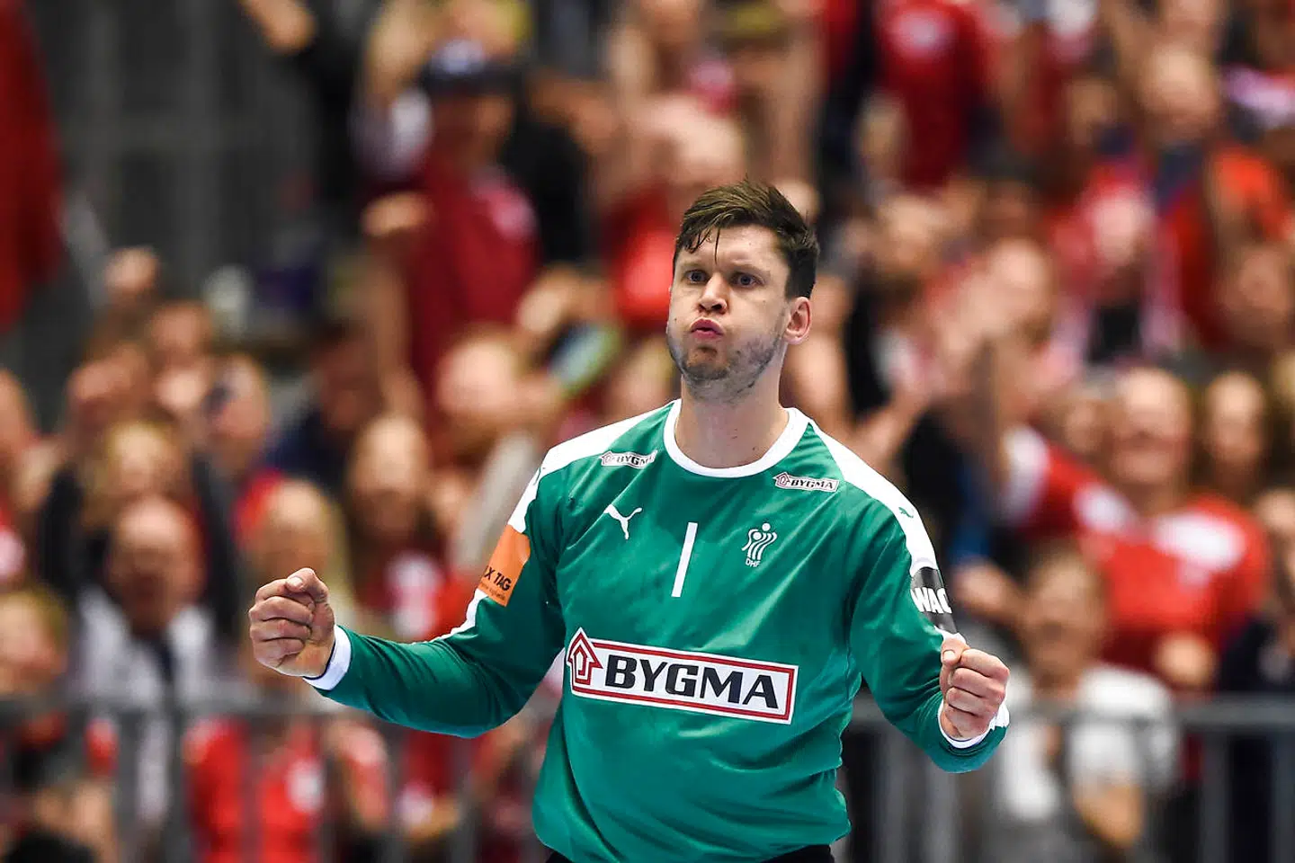 Denmark's goalkeeper Niklas Landin Jacobsen celebrates after saving a shot during the IHF Men's World Championship 2019 Group II main round handball match between Denmark and Sweden at the Jyske Bank Boxen arena in Herning on January 23, 2019. (Photo by Jonathan NACKSTRAND / AFP)