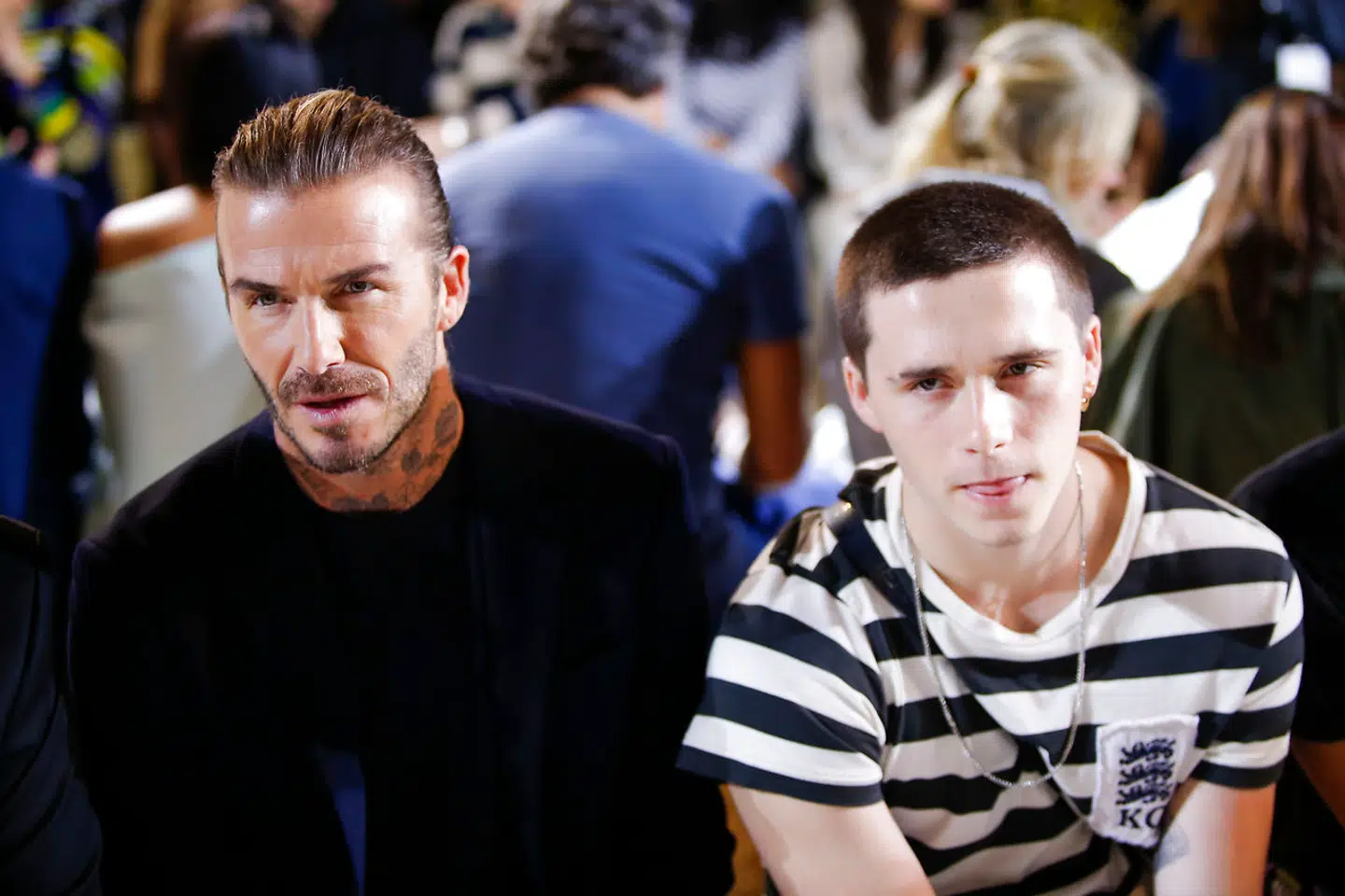 David Beckham med sin søn Brooklyn Beckham under et modeshow i New York, USA, 10. september 2017.
